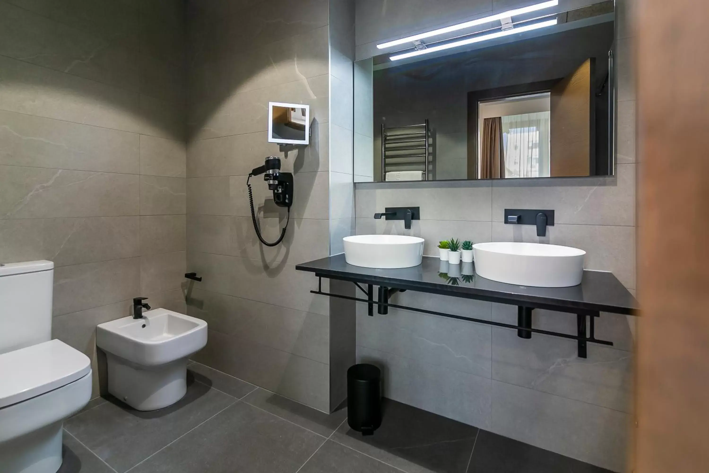 Toilet, Bathroom in Aquitania Home Suites