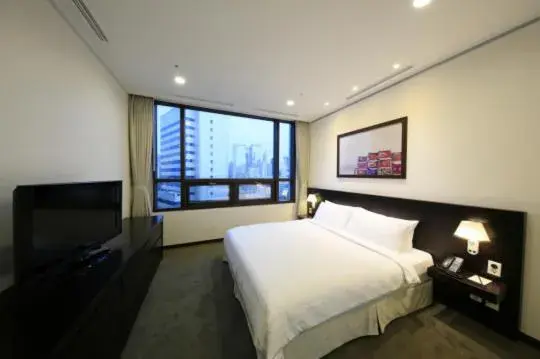 Bed in Orakai Insadong Suites