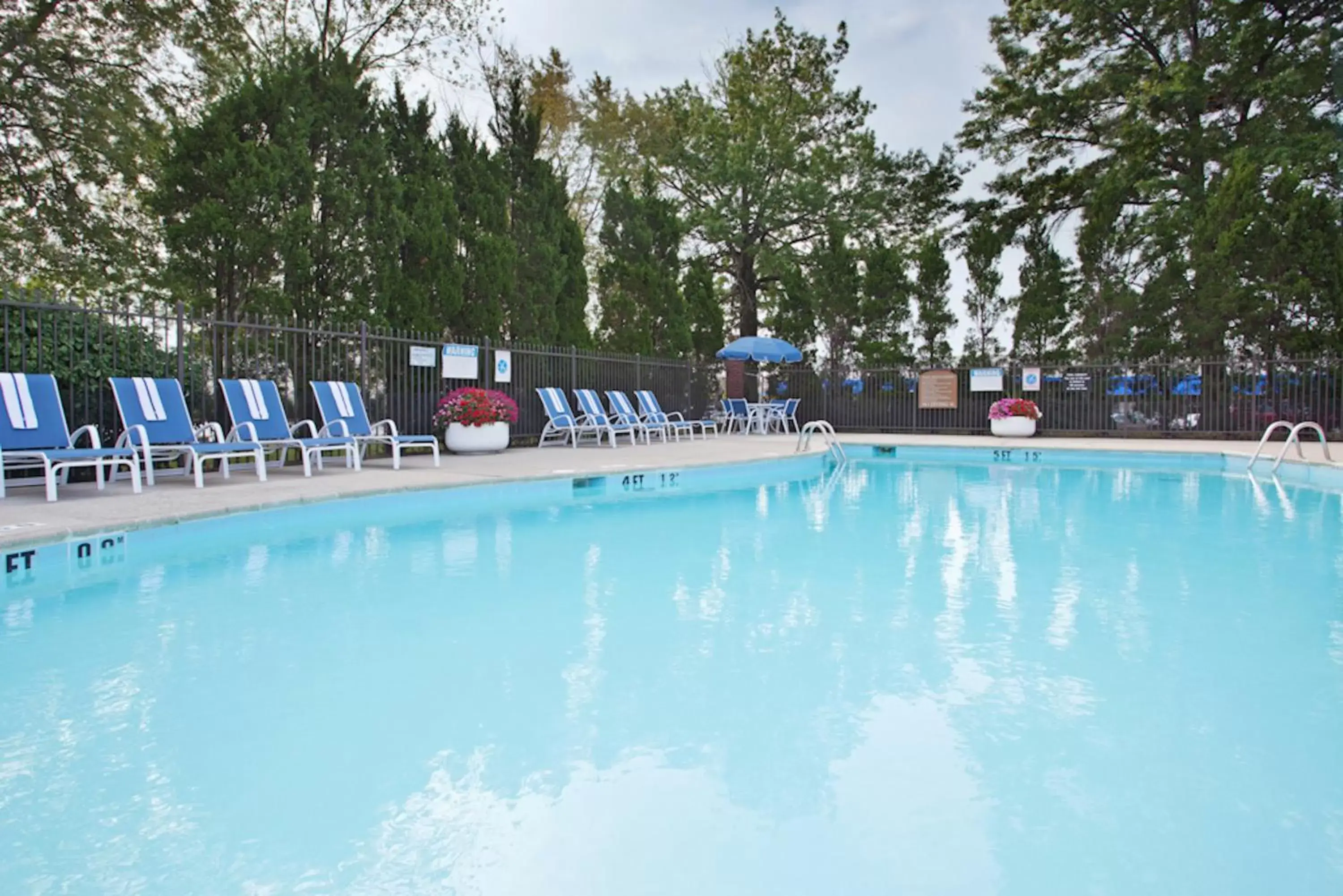 Swimming Pool in Holiday Inn Express Detroit-Warren/General Motors Technology Center, an IHG Hotel
