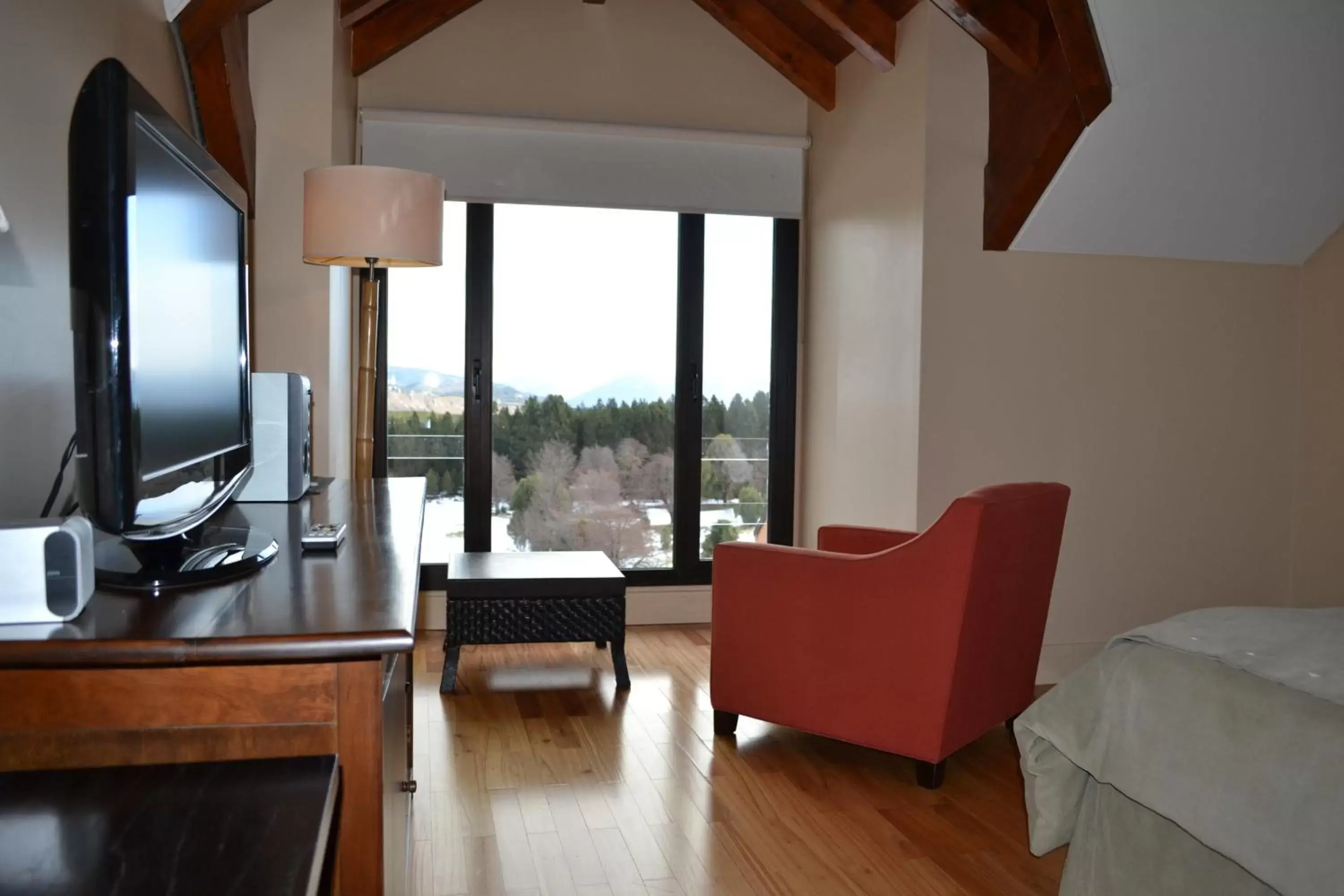 Bedroom, Seating Area in Loi Suites Chapelco Hotel