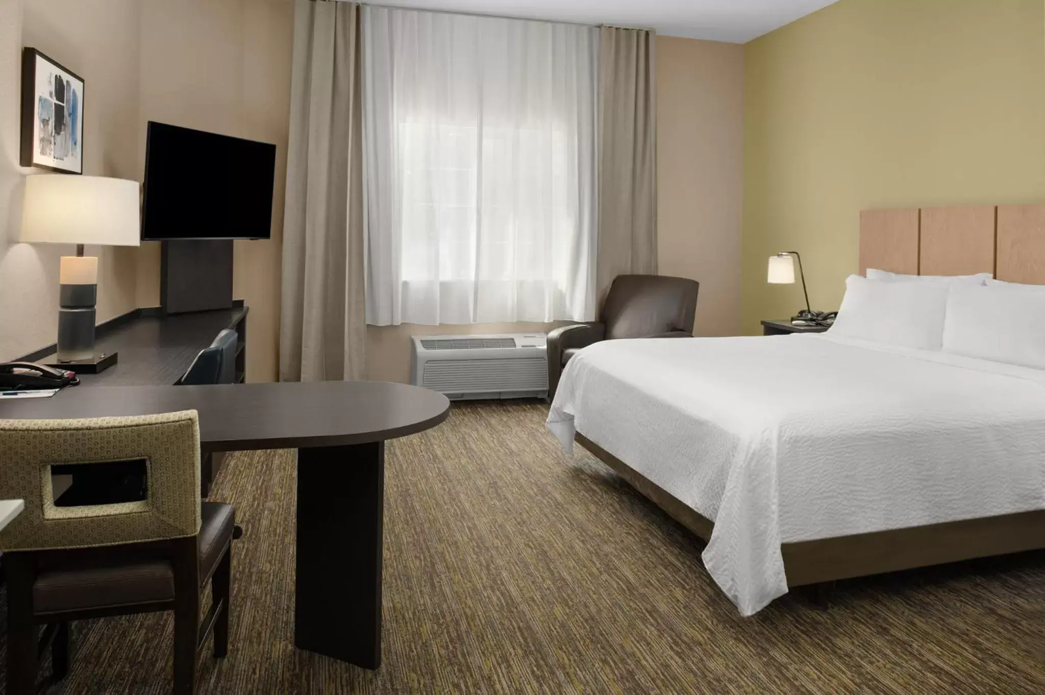 Photo of the whole room, Bed in Candlewood Suites Turlock, an IHG Hotel