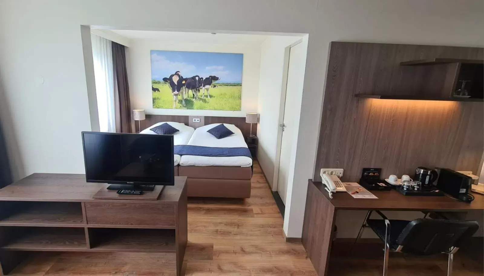 Bed, TV/Entertainment Center in Best Western Hotel Slenaken