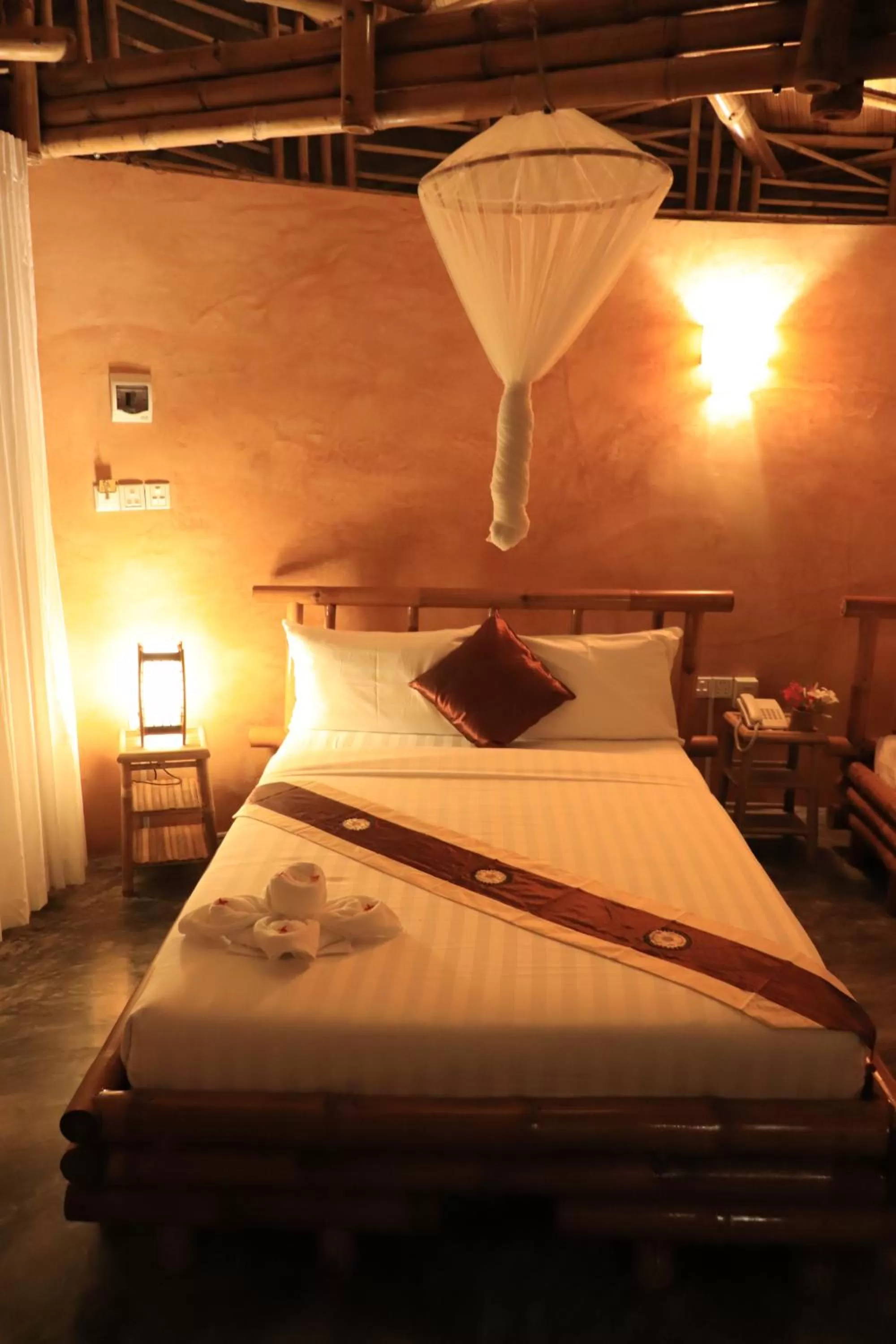 Bed in Hanchey Bamboo Resort