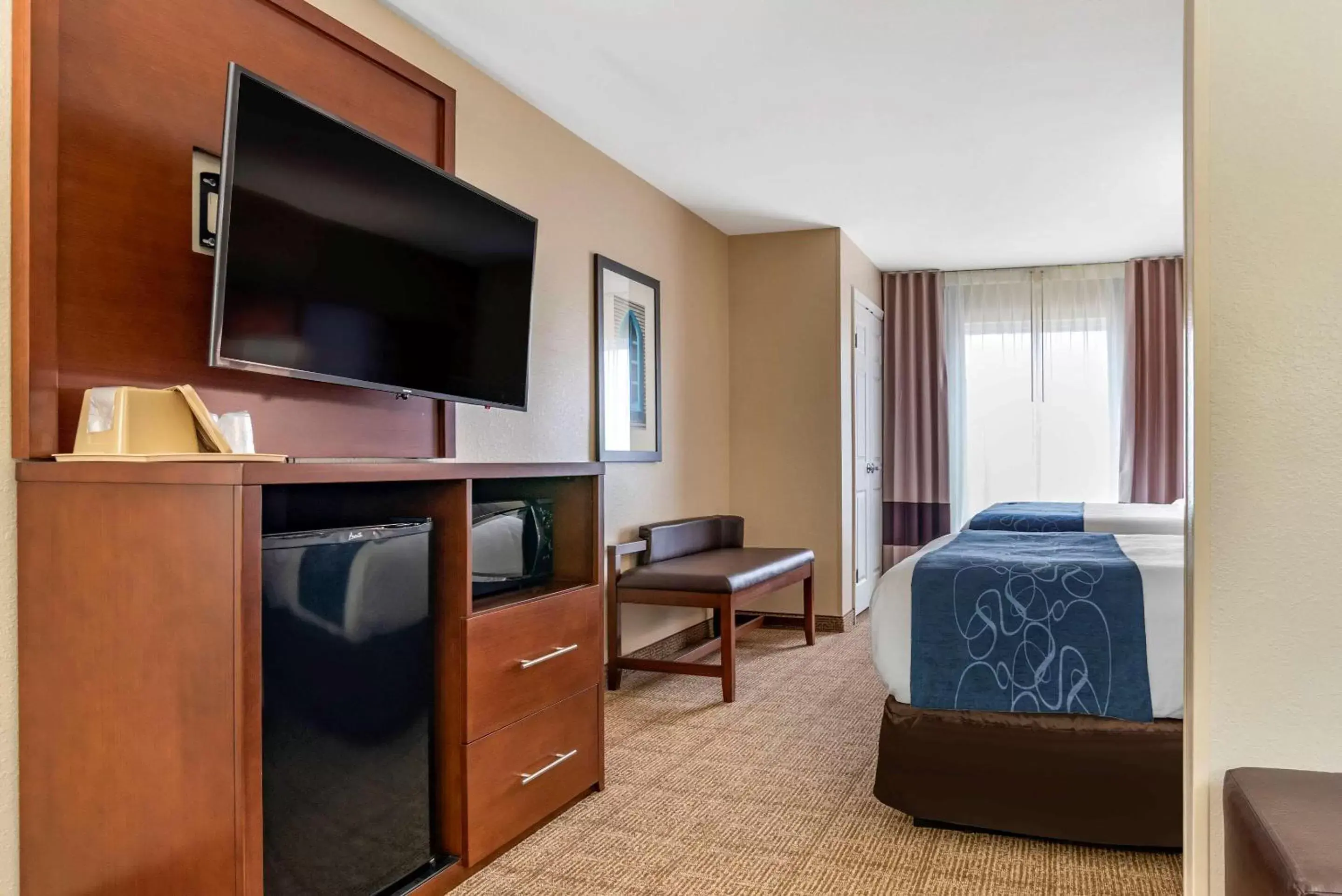 Photo of the whole room, TV/Entertainment Center in Comfort Suites Niceville Near Eglin Air Force Base