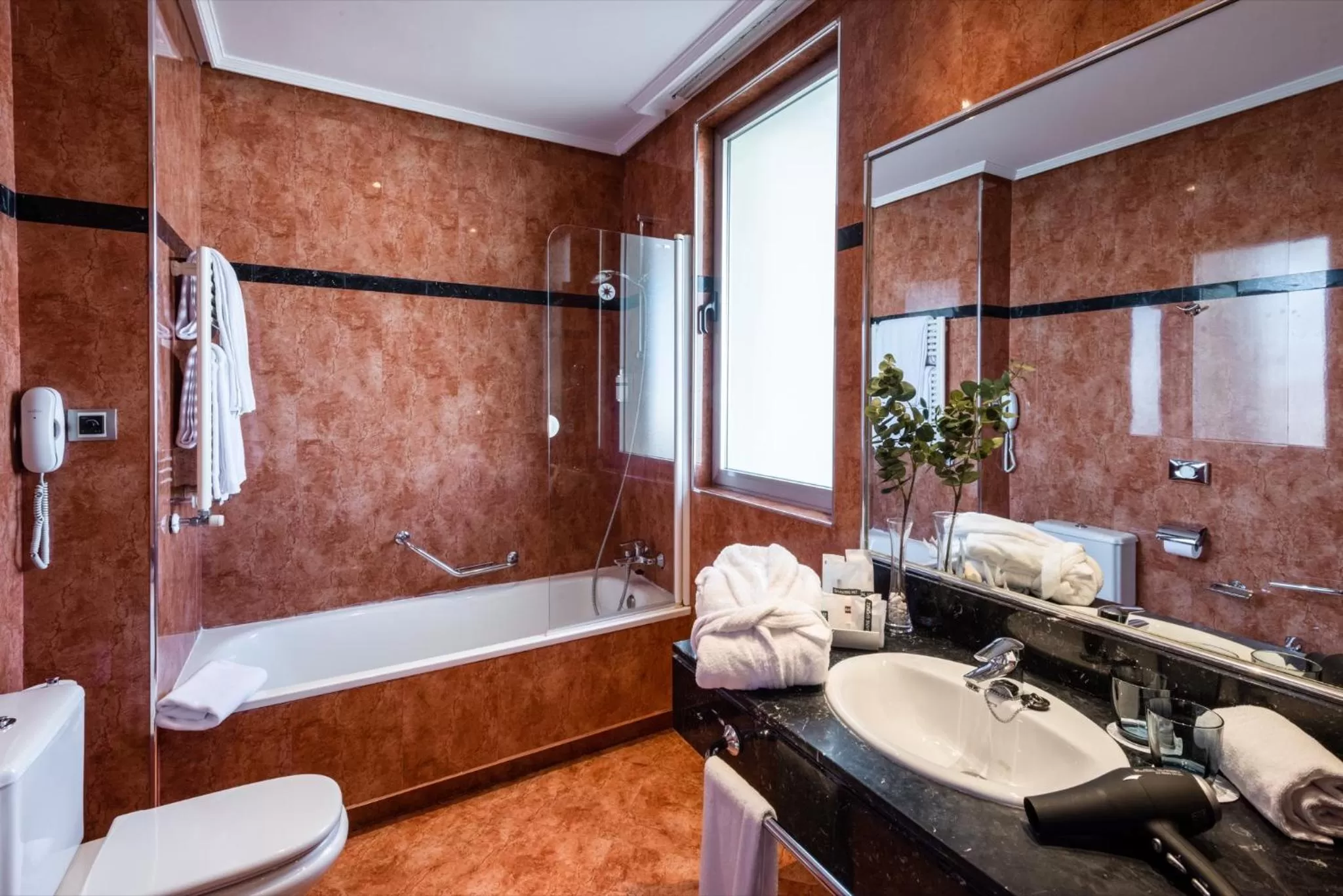 Bathroom in Hotel Madrid Plaza de España, Affiliated by Meliá