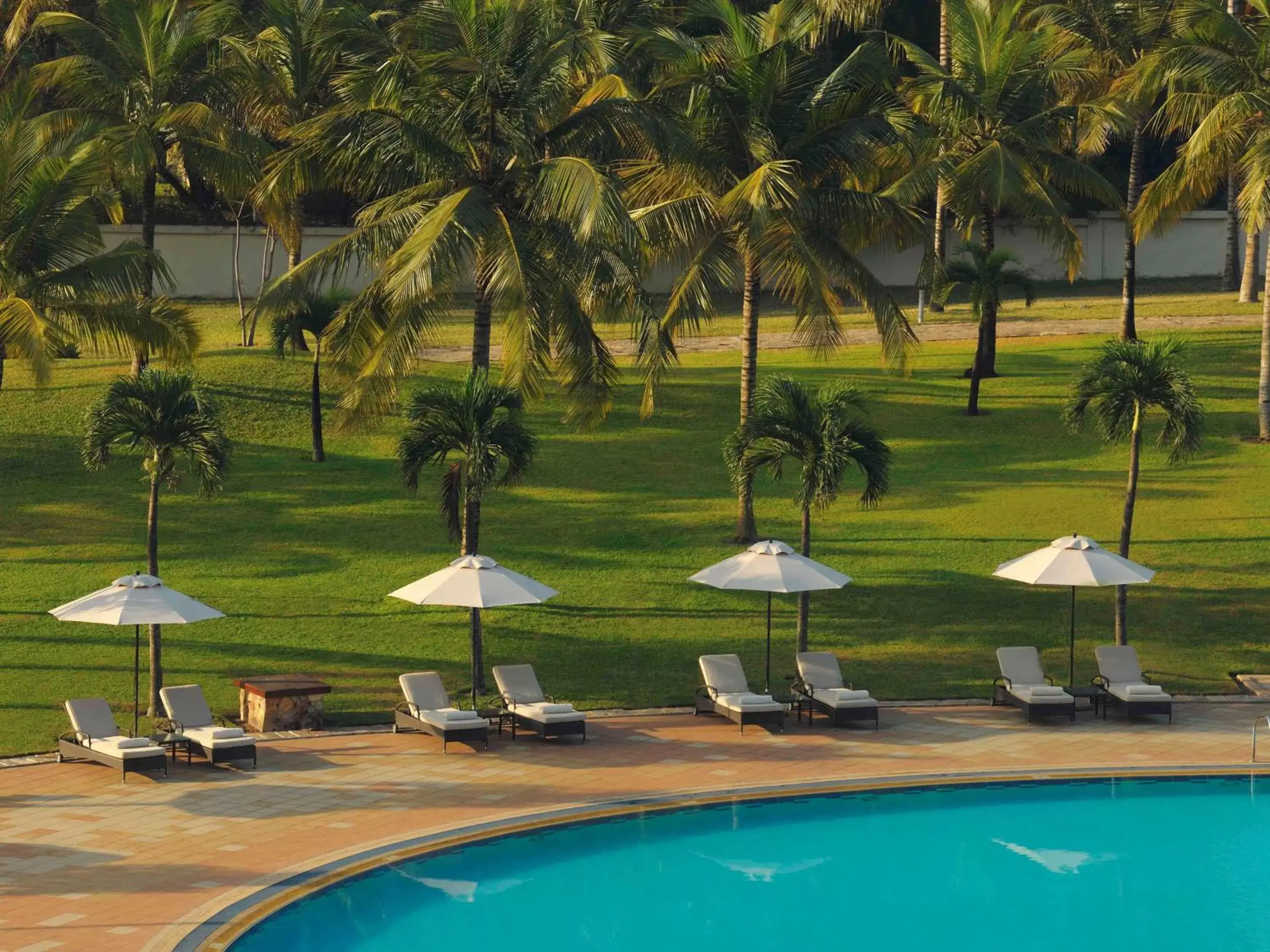 Photo of the whole room, Swimming Pool in Mövenpick Ambassador Hotel Accra