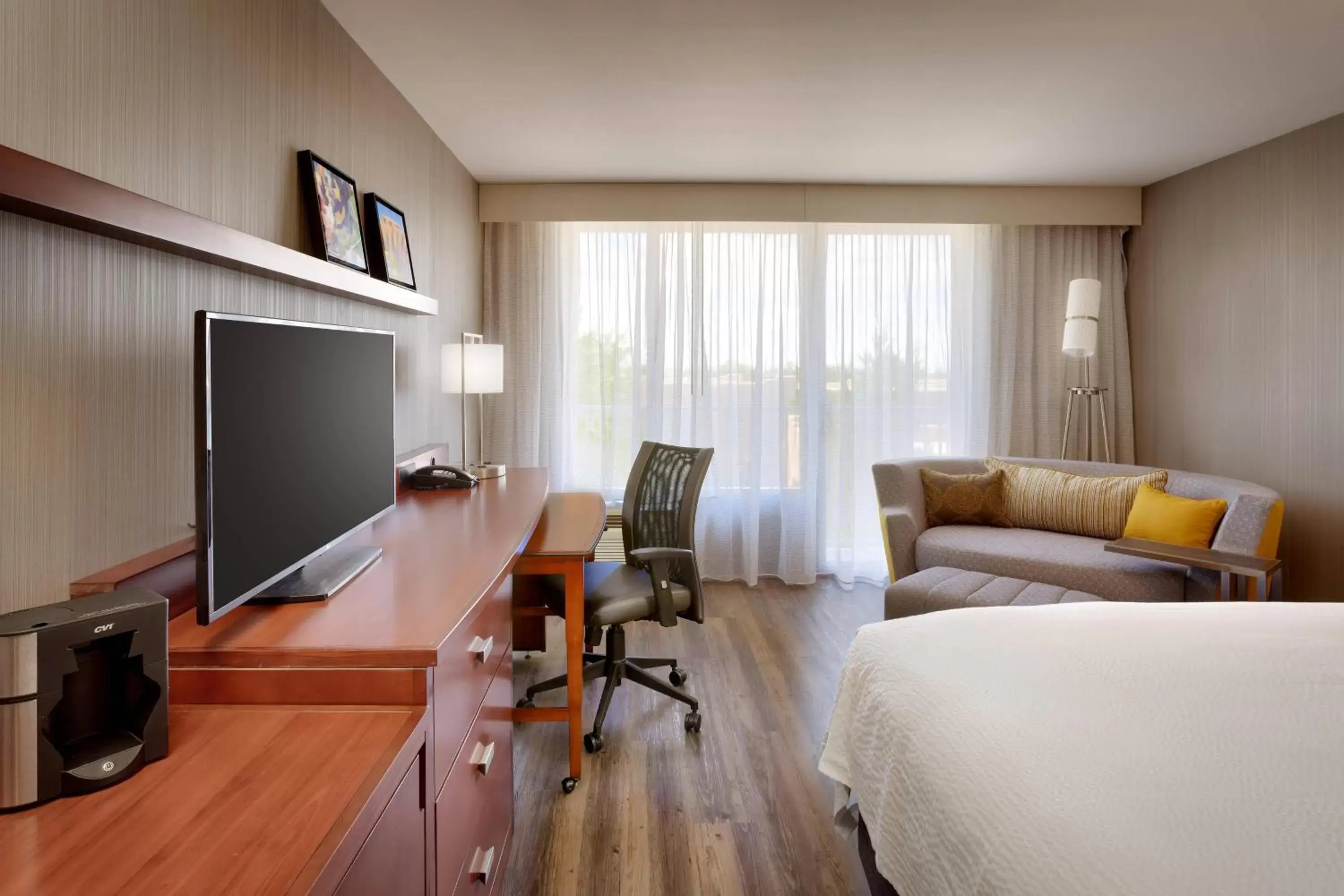 Photo of the whole room, TV/Entertainment Center in Courtyard by Marriott Albuquerque