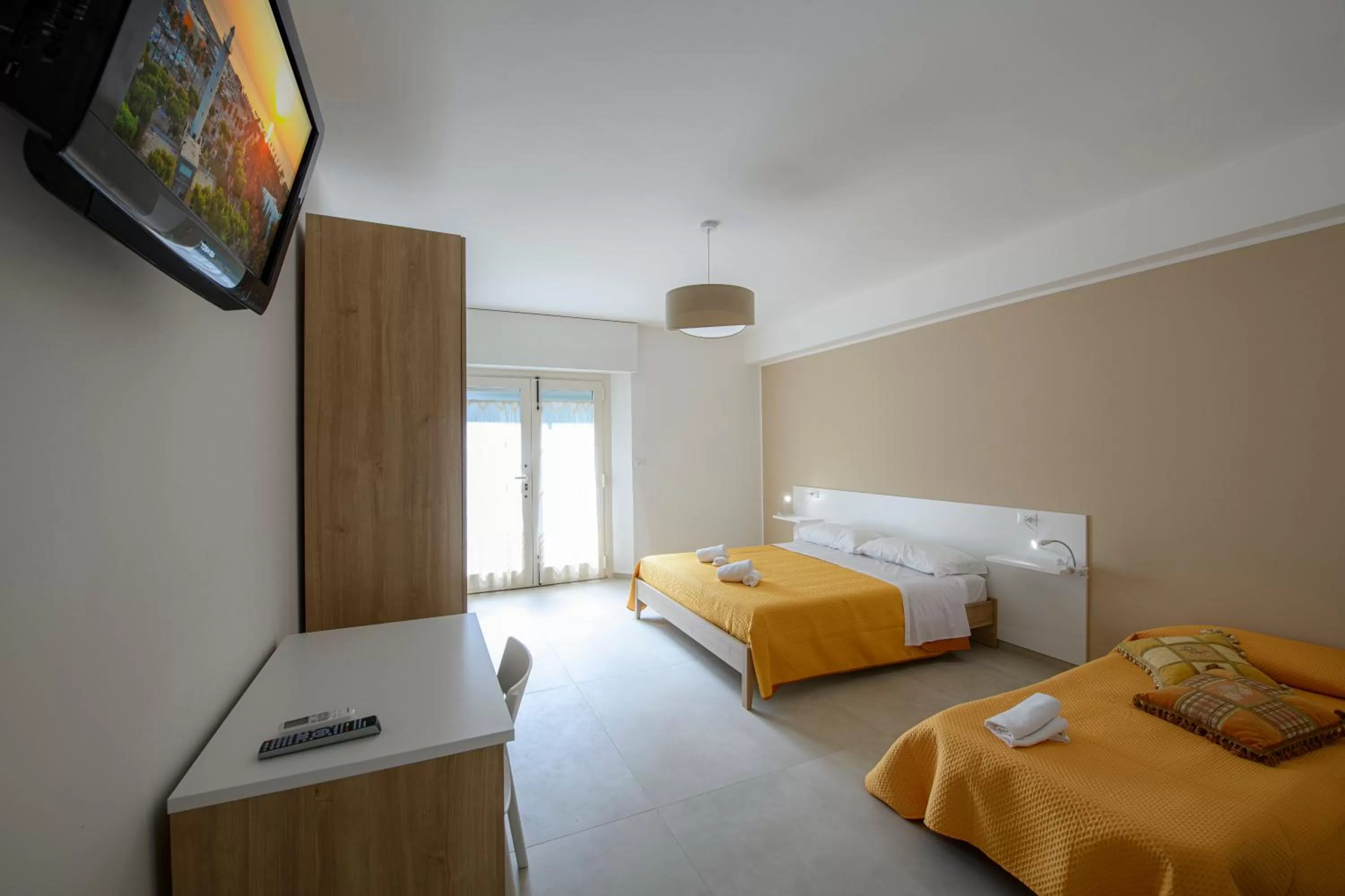 Bed, TV/Entertainment Center in B&B La Fontanella