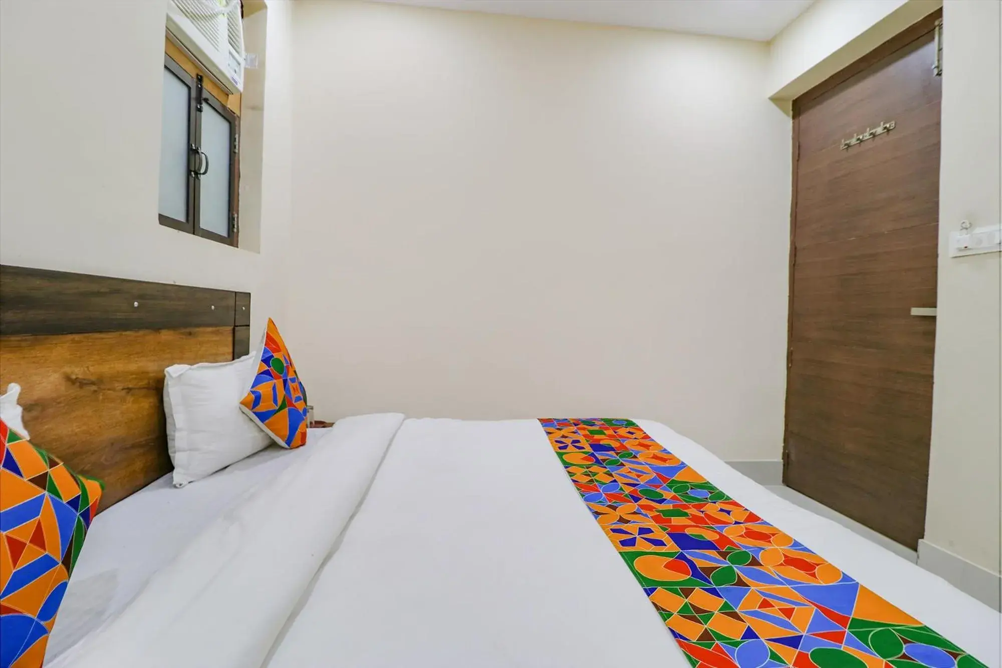 Bed in FabExpress Kartikey Inn