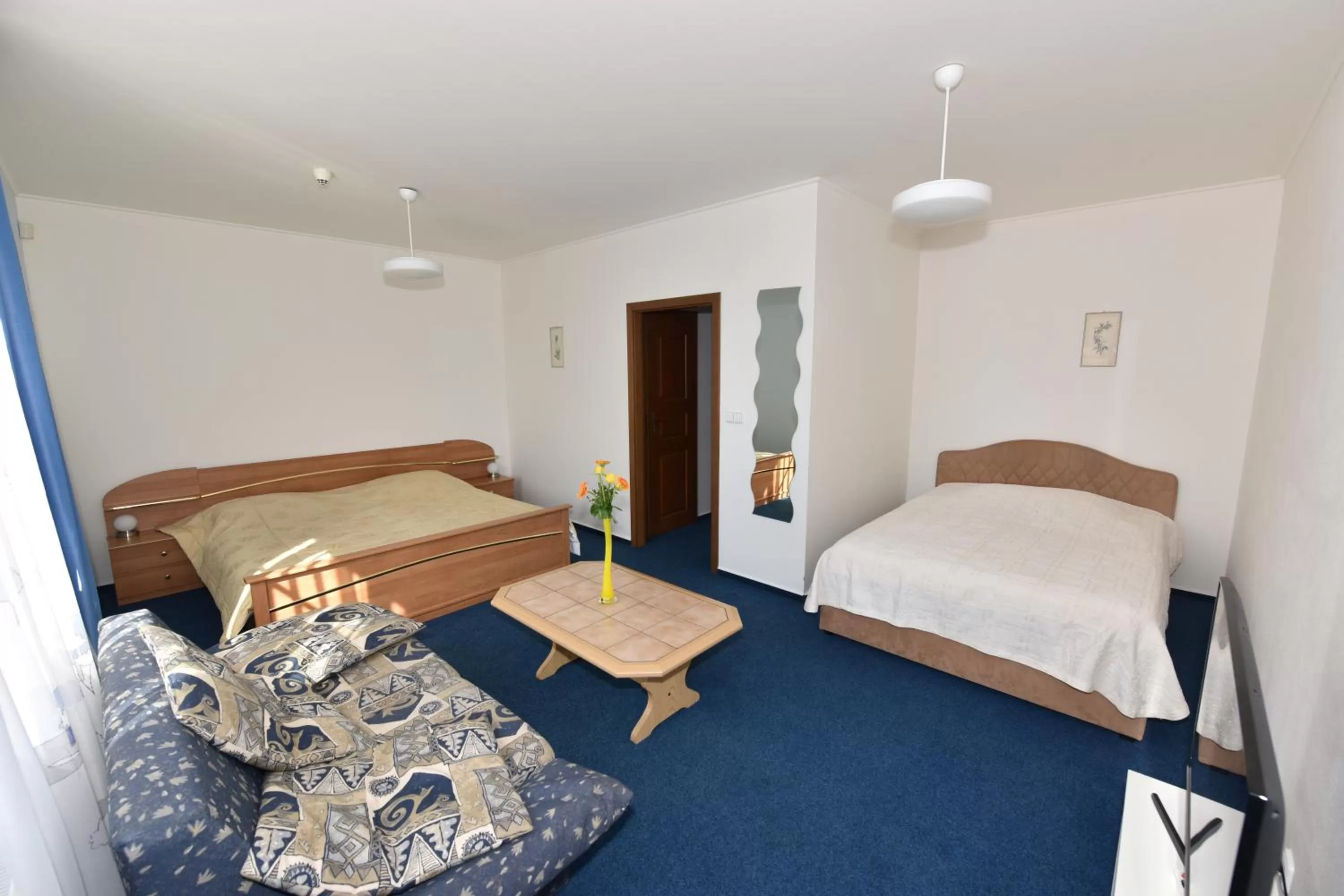 Shower, Bed in Hotel Trilobit