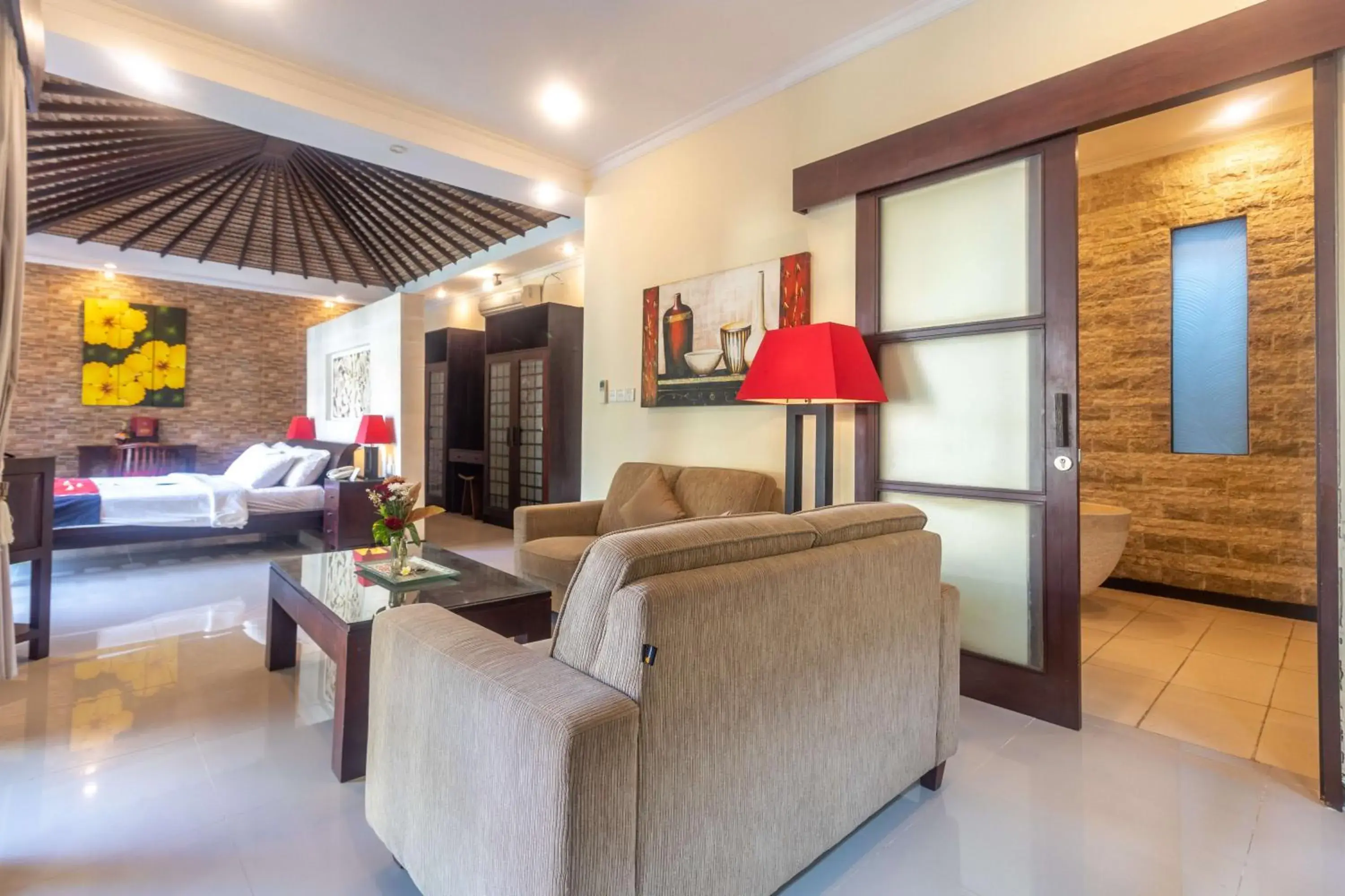 Bedroom, Seating Area in Aleesha Villas and Suites