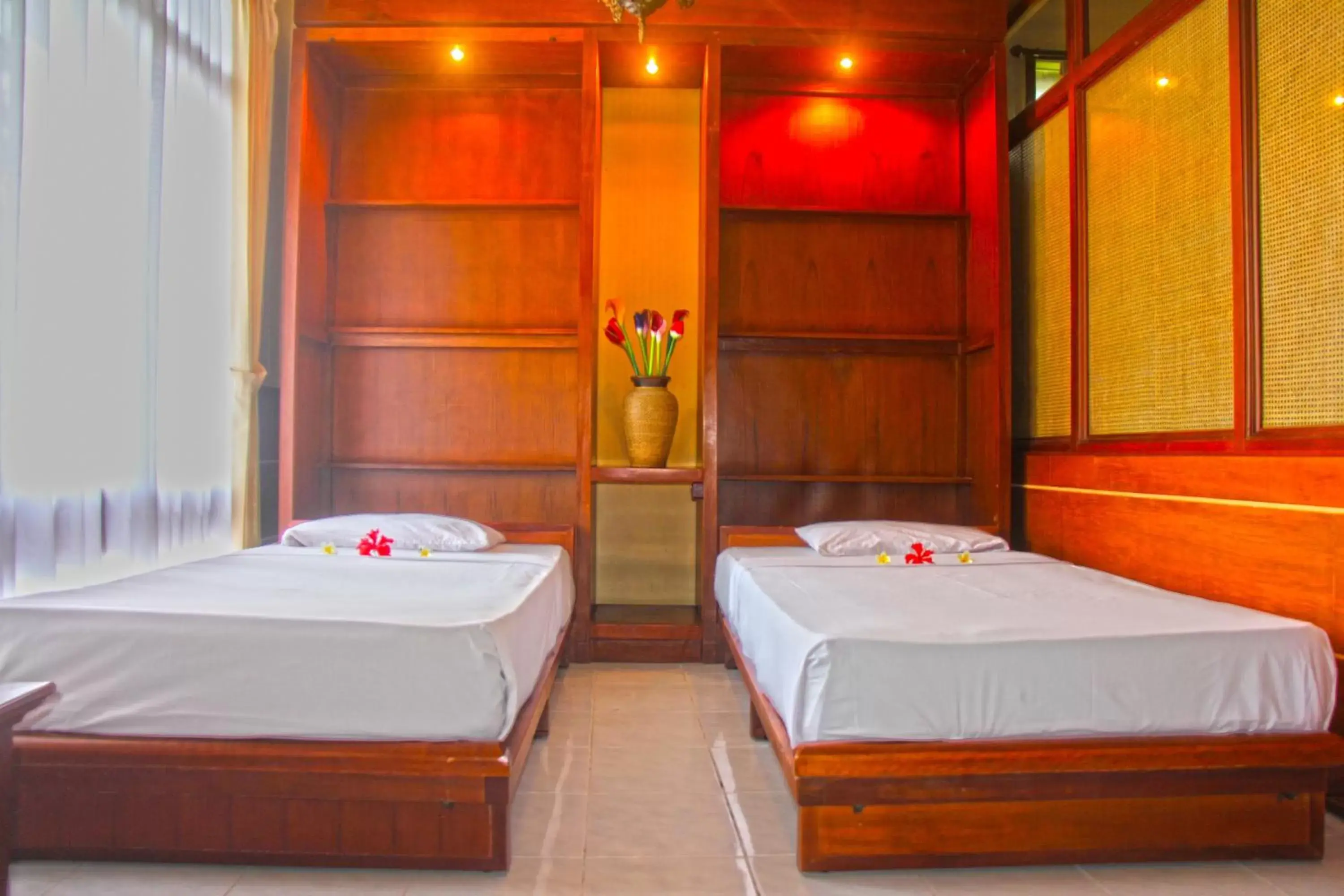 Bed in Melasti Beach Resort & Spa Legian