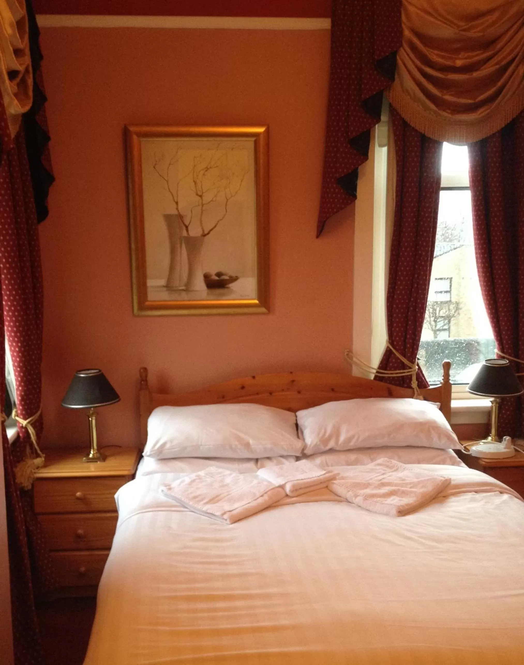 Bed in Twin Lions Hotel