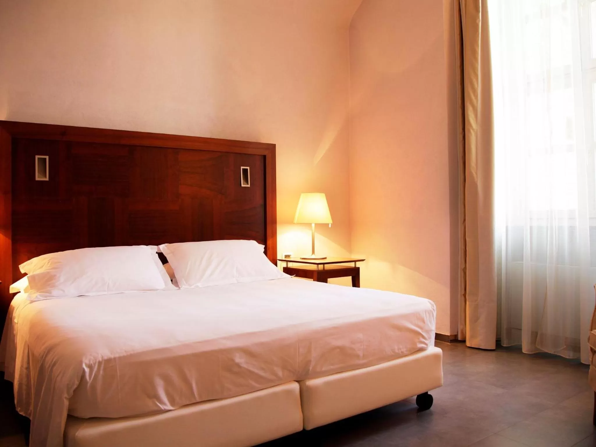 Bed in Montaldo Castle & Resort