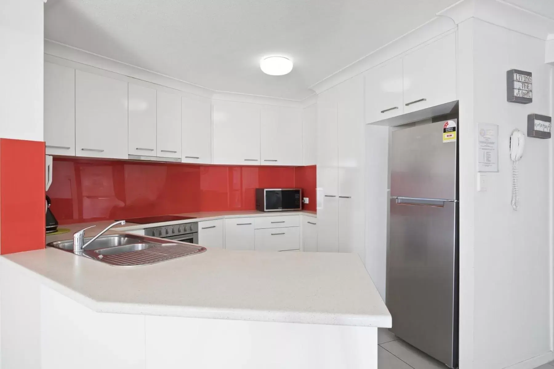 Kitchen or kitchenette, Kitchen/Kitchenette in Kirra Palms Holiday Apartments