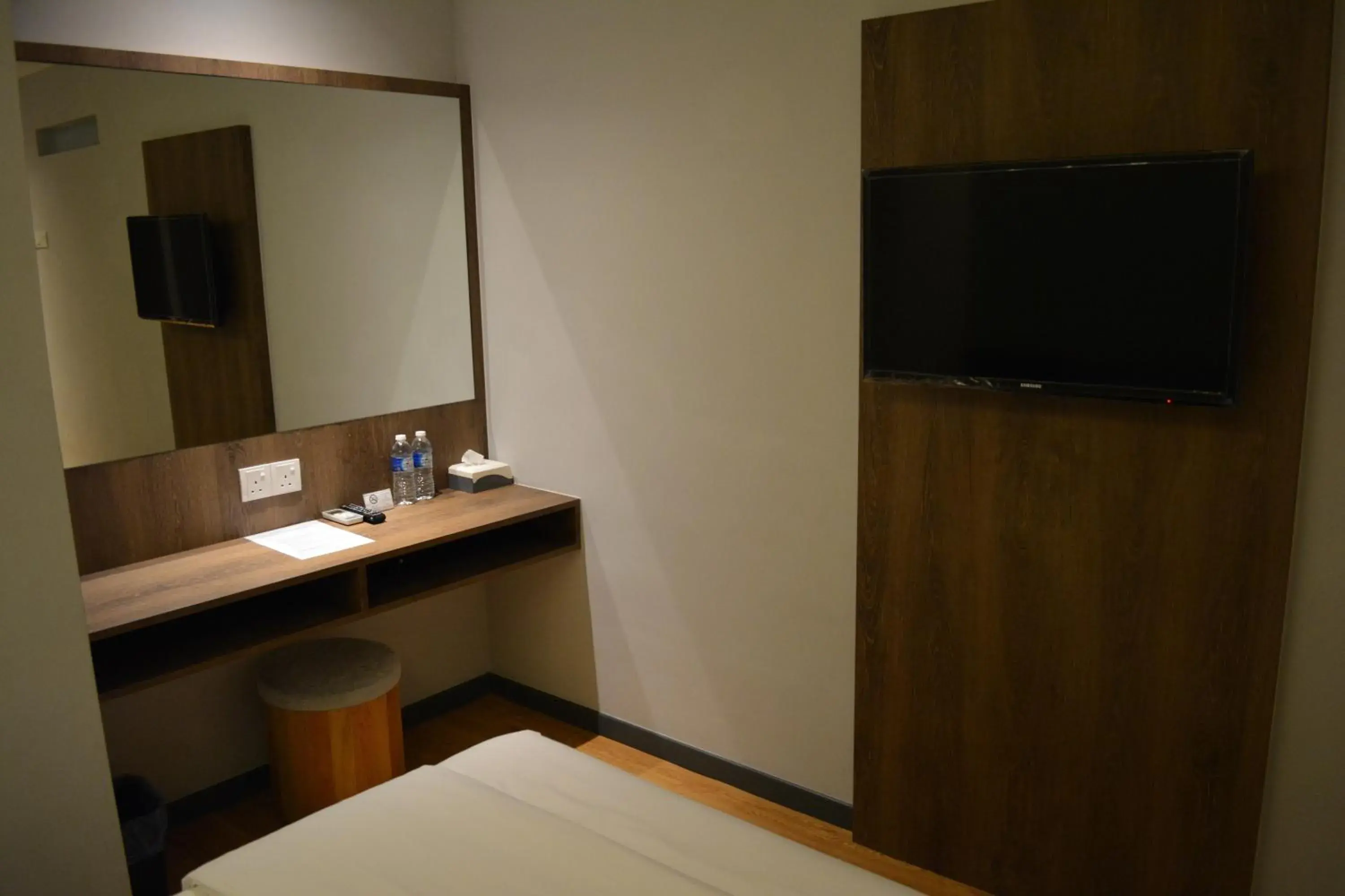 Photo of the whole room, TV/Entertainment Center in Go Hotel