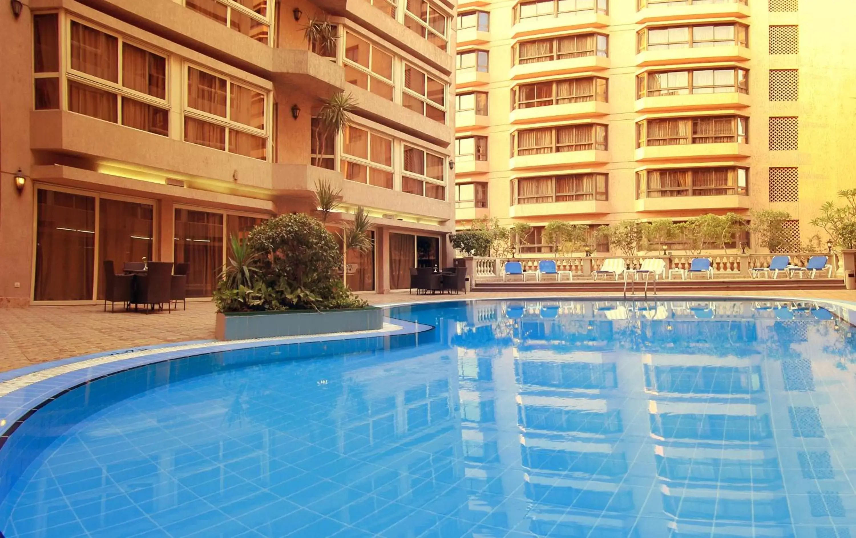 Seating area, Swimming Pool in Pyramisa Suites Hotel Cairo