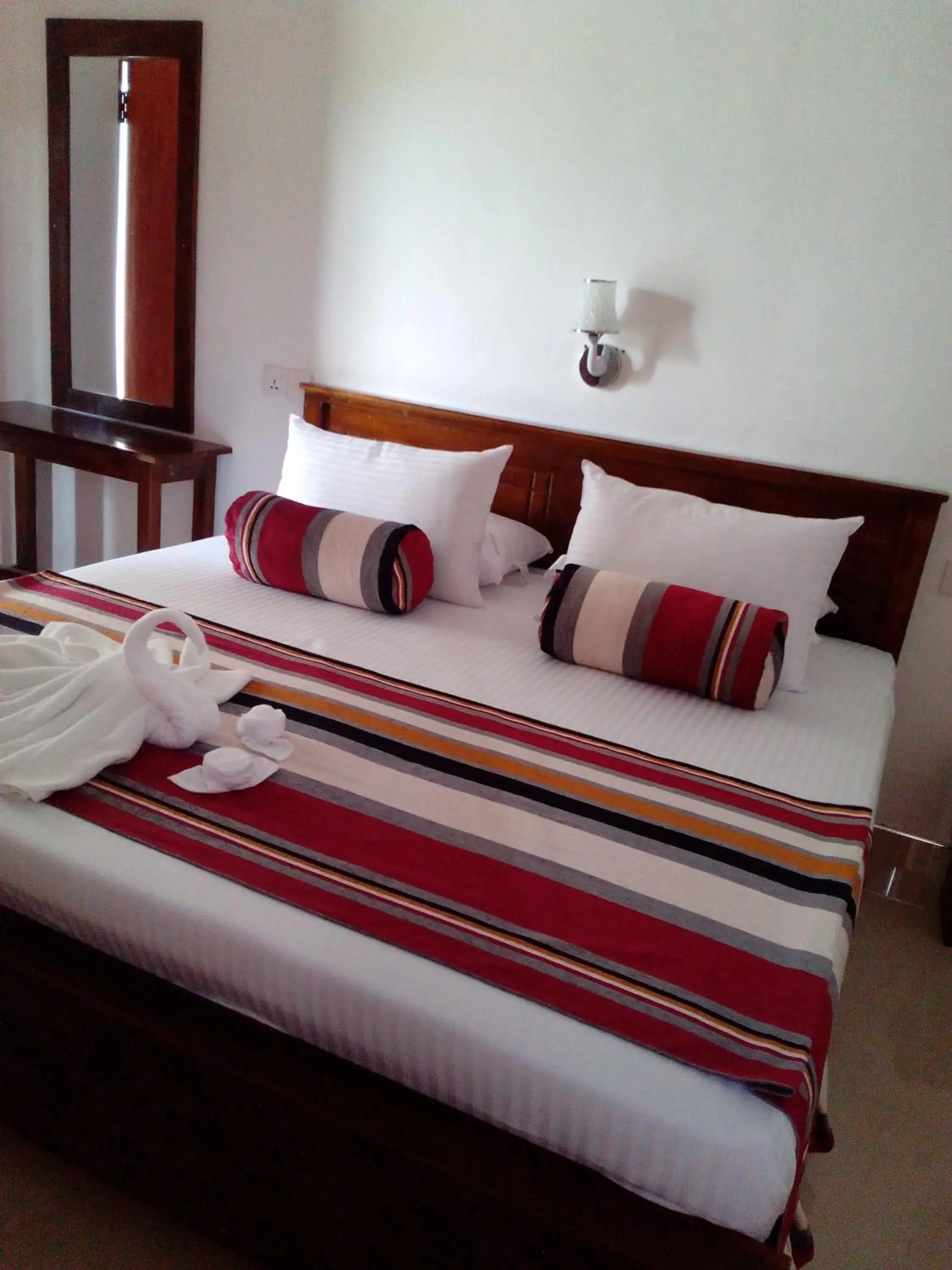 Bed in MOONSTONE HOTEL