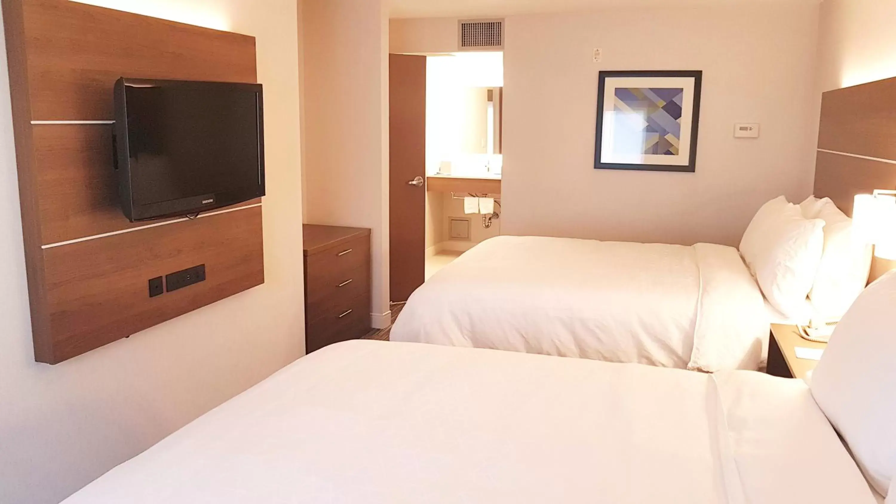 Bedroom, Bed in Holiday Inn Express and Suites Surrey, an IHG Hotel