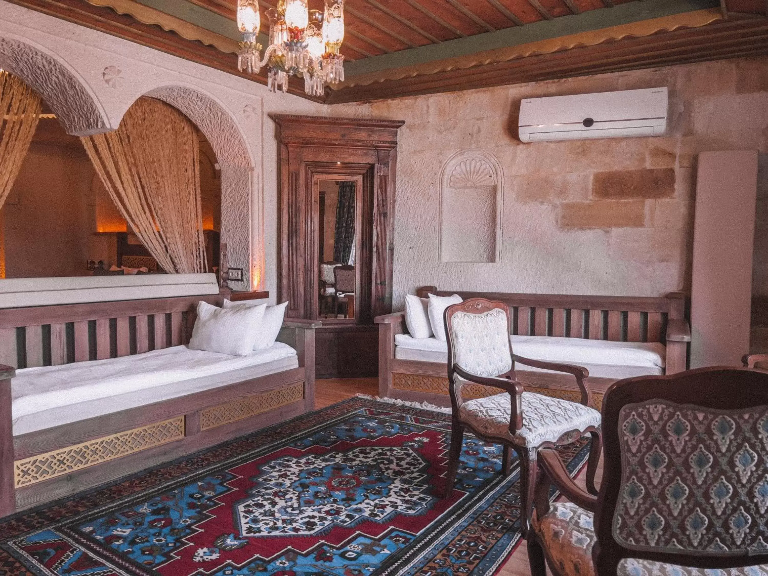 Bedroom, Seating Area in Local Cave House Hotel