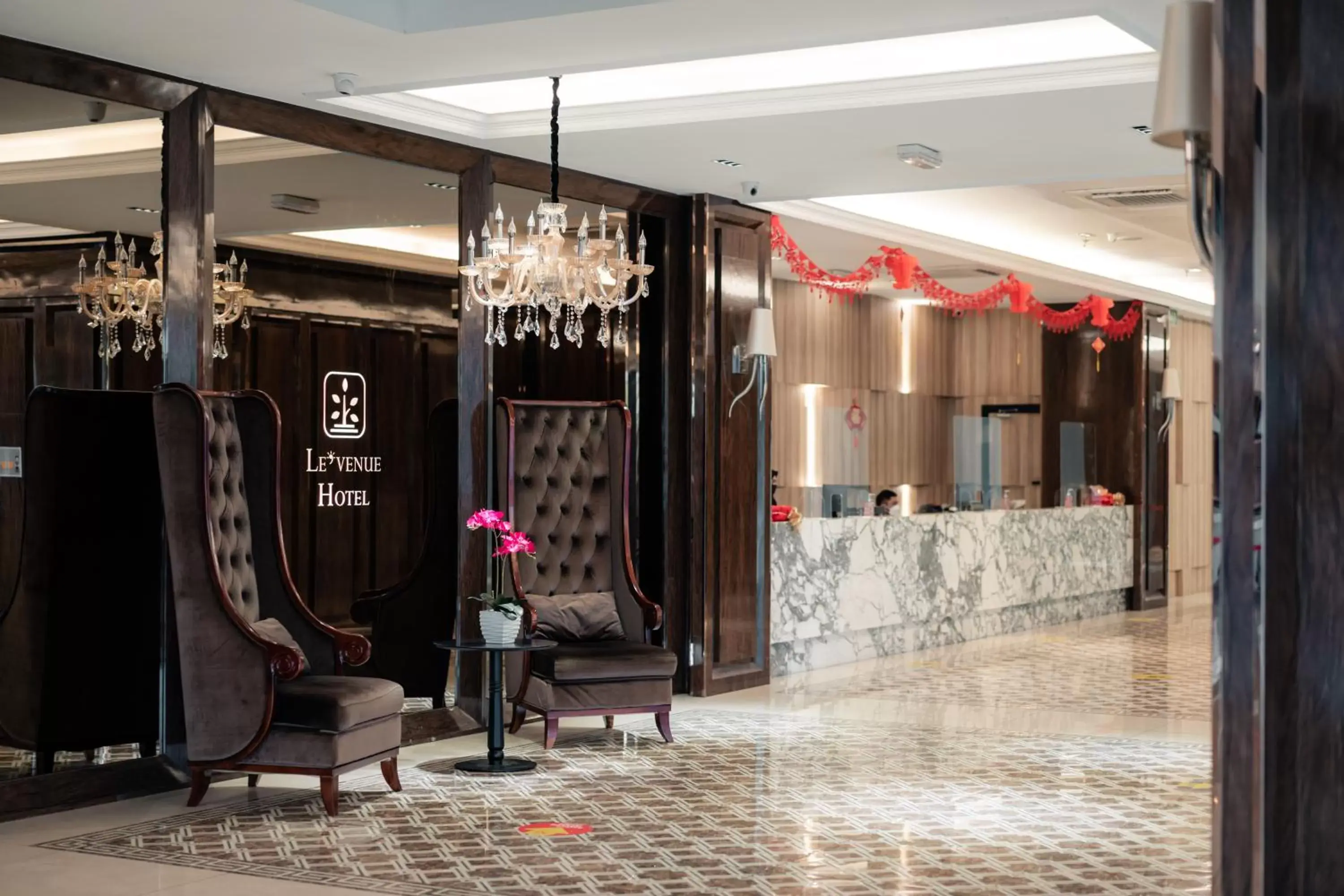 Lobby or reception in Le'venue Hotel