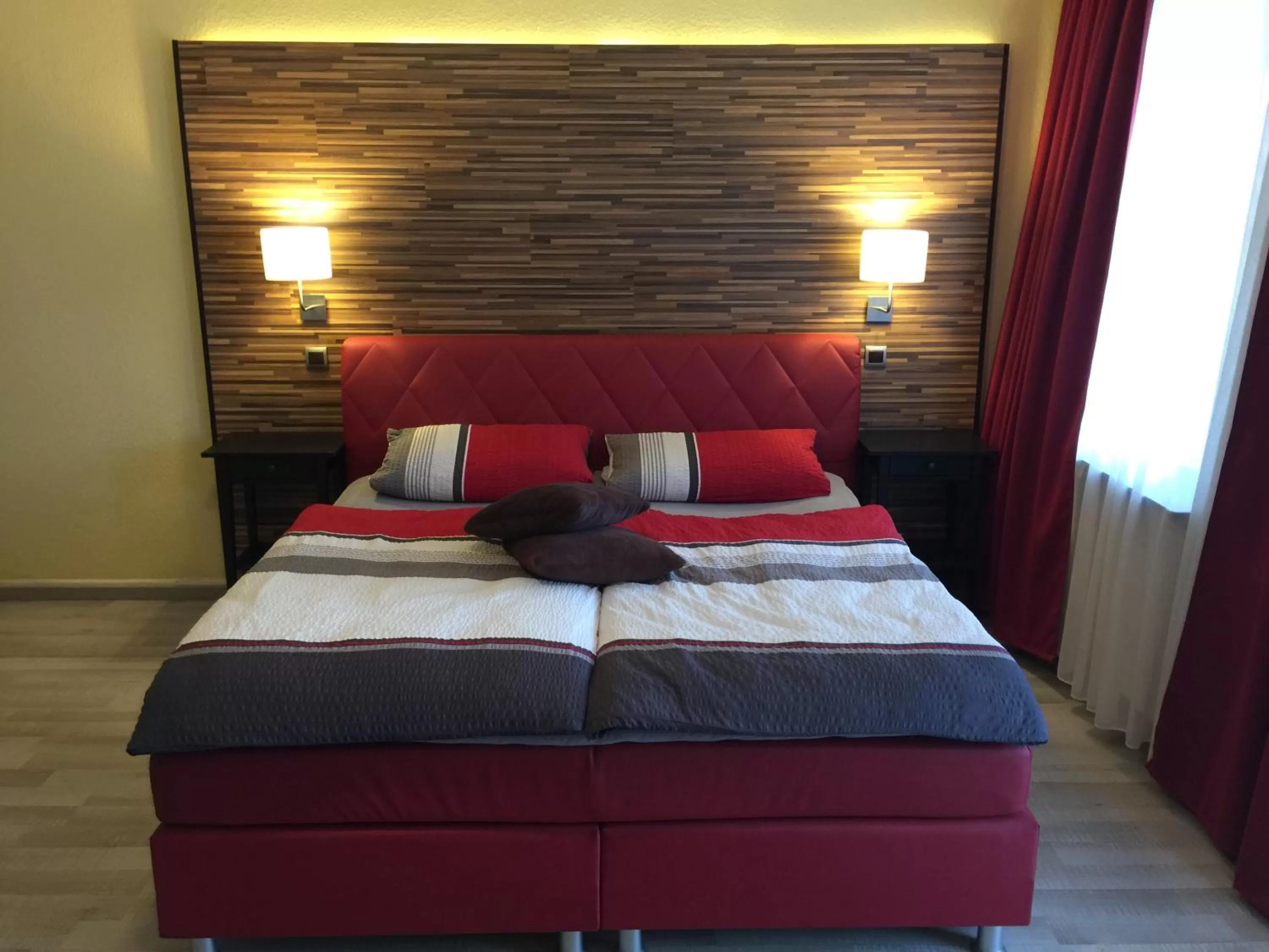 Bed in Hotel Rhein INN