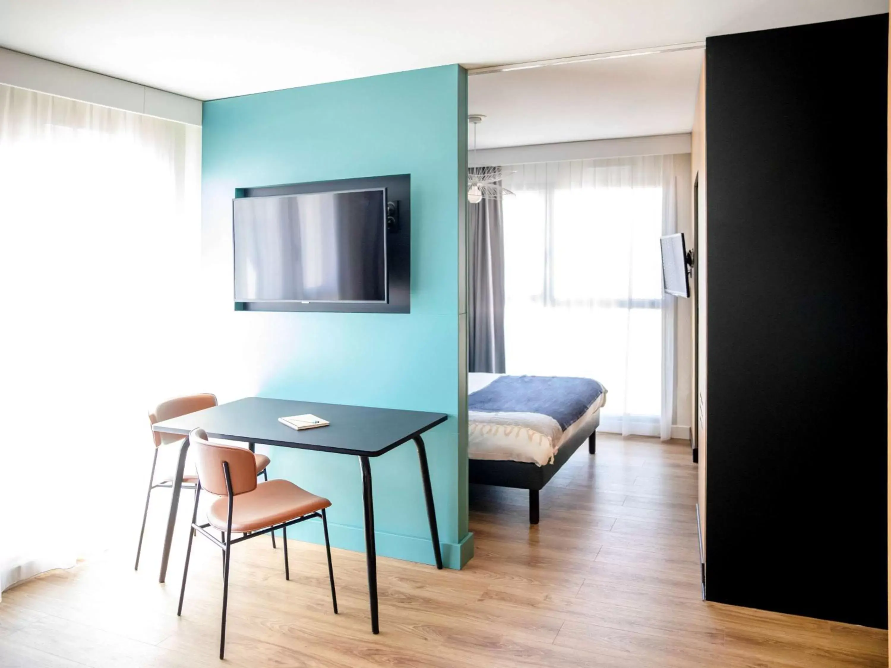Photo of the whole room, TV/Entertainment Center in Aparthotel Adagio Annecy Centre