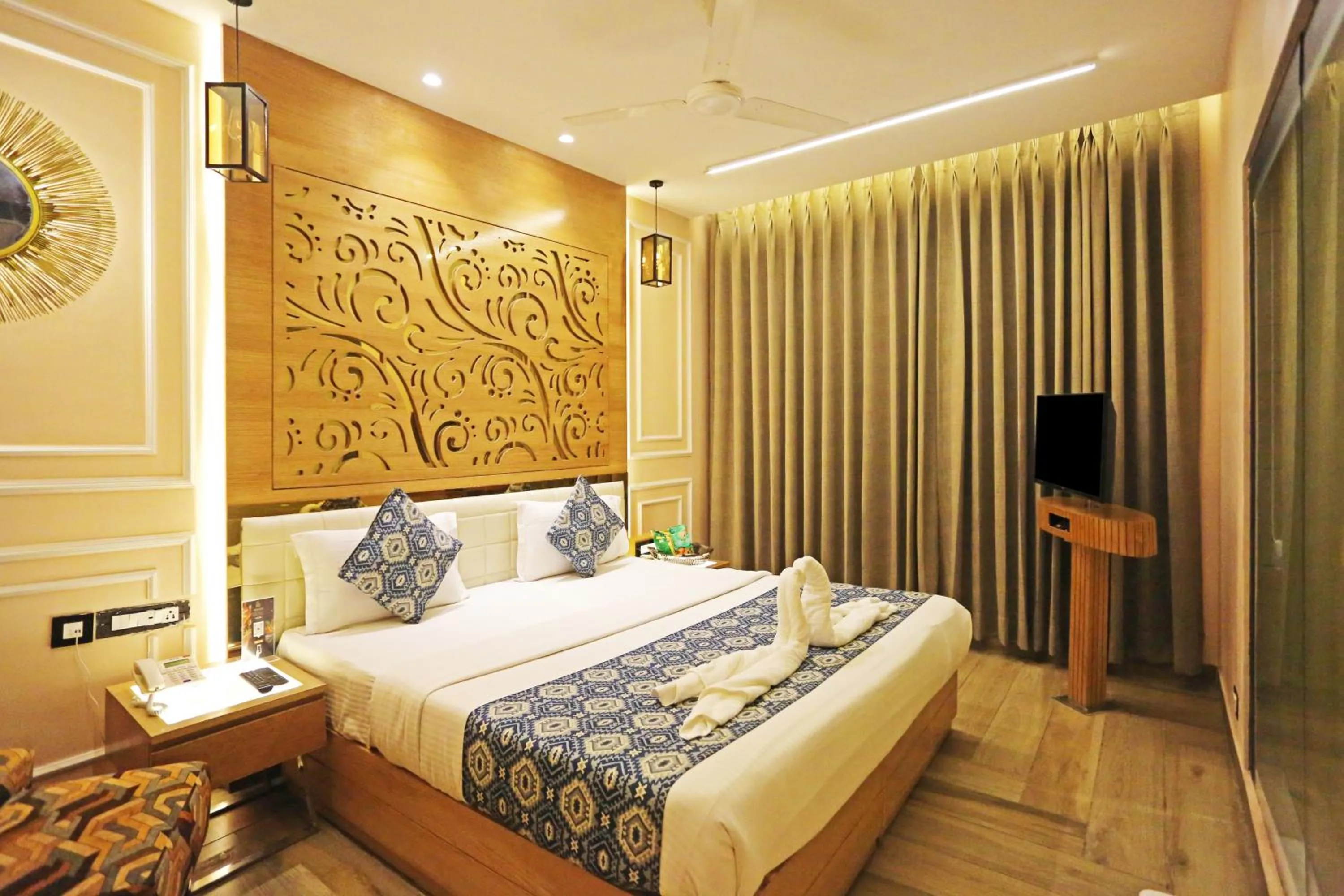 Bed in JRD Luxury-Business Hotel