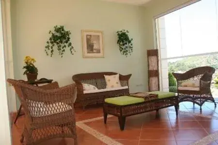 Living room, Seating Area in Pousada Portal das Cerejeiras