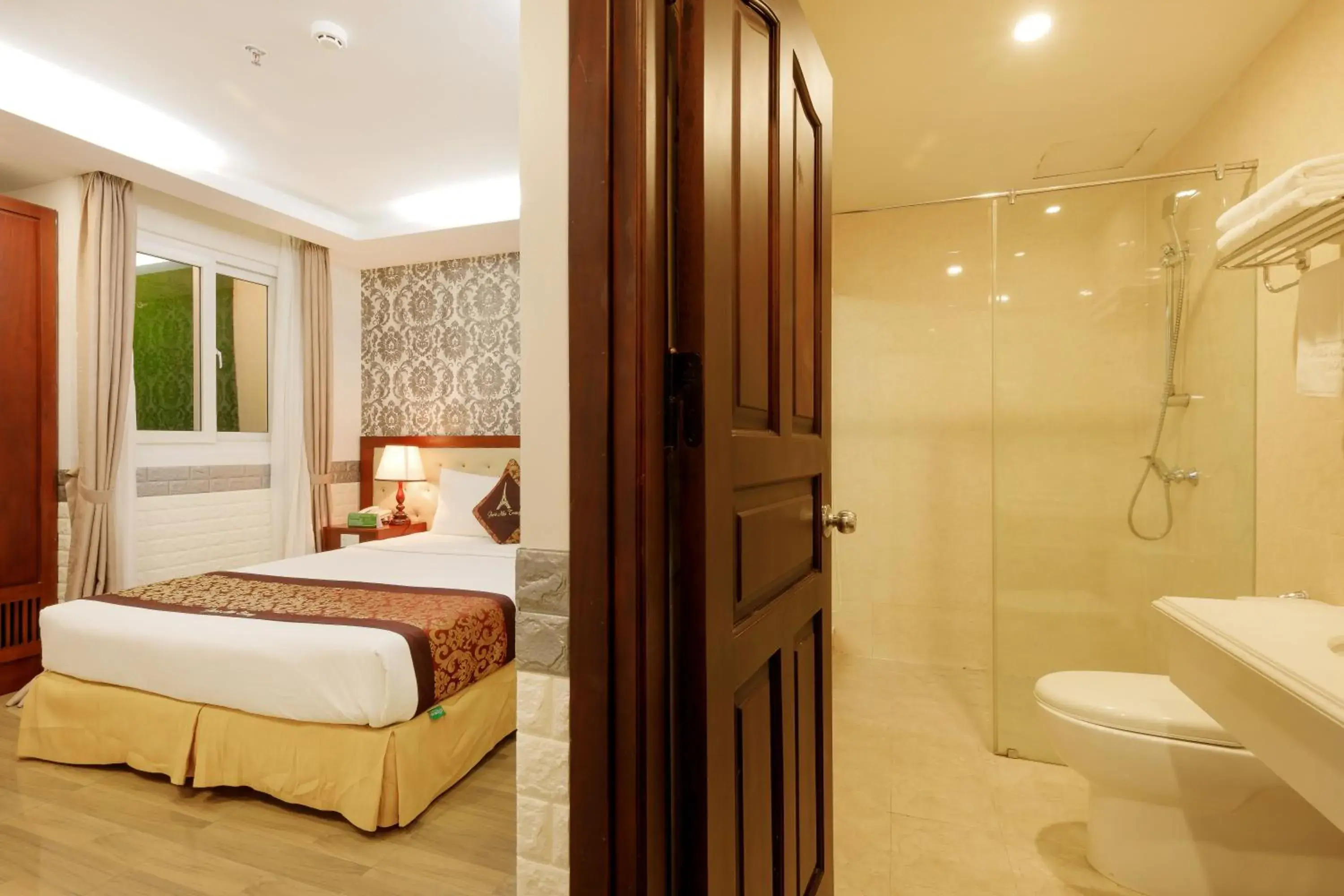 Bed, Bathroom in Paris Nha Trang Hotel