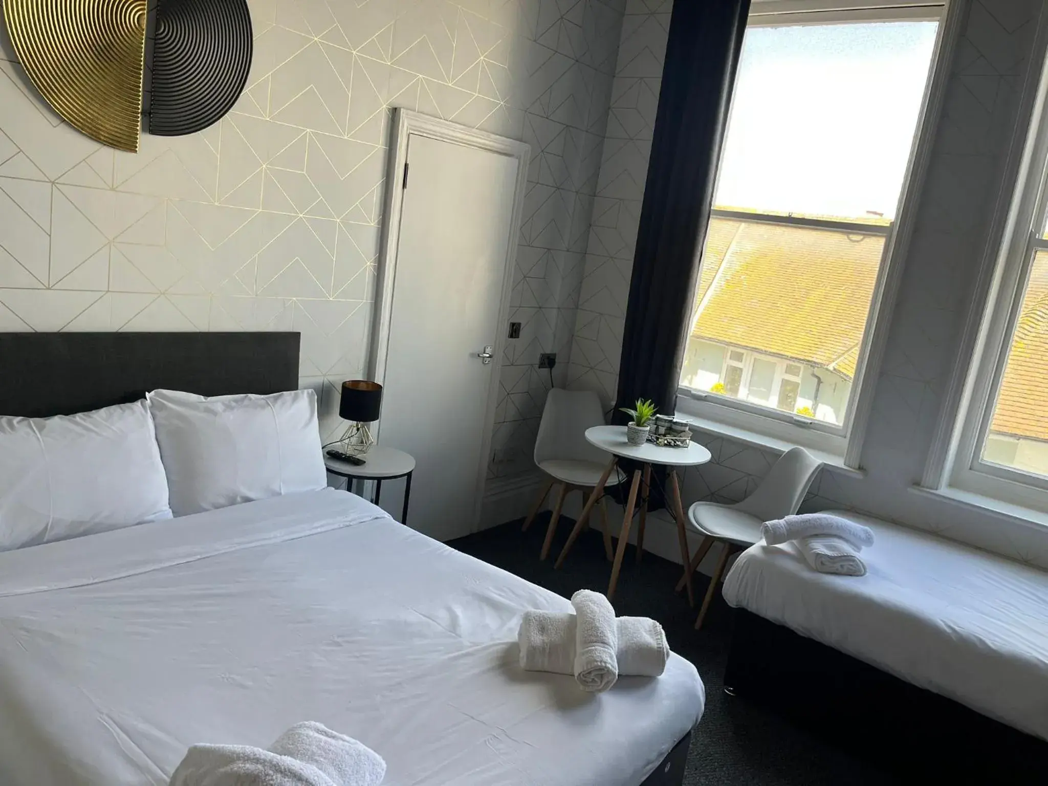 Bedroom, Bed in OYO Marine Parade Hotel, Eastbourne Pier Bedroom, Bed in OYO Marine Parade Hotel, Eastbourne Pier