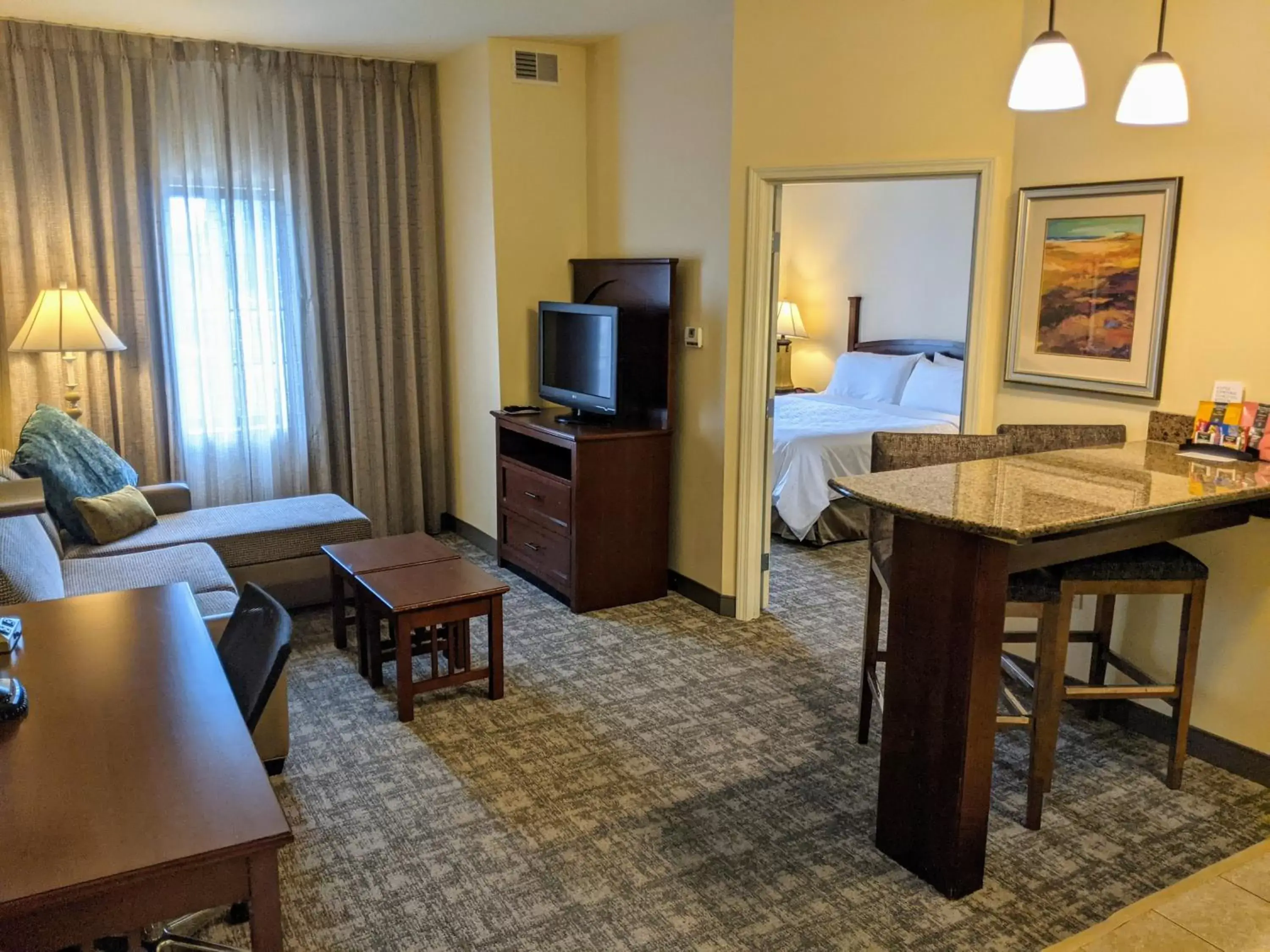 Photo of the whole room, TV/Entertainment Center in Staybridge Suites Indianapolis-Carmel, an IHG Hotel