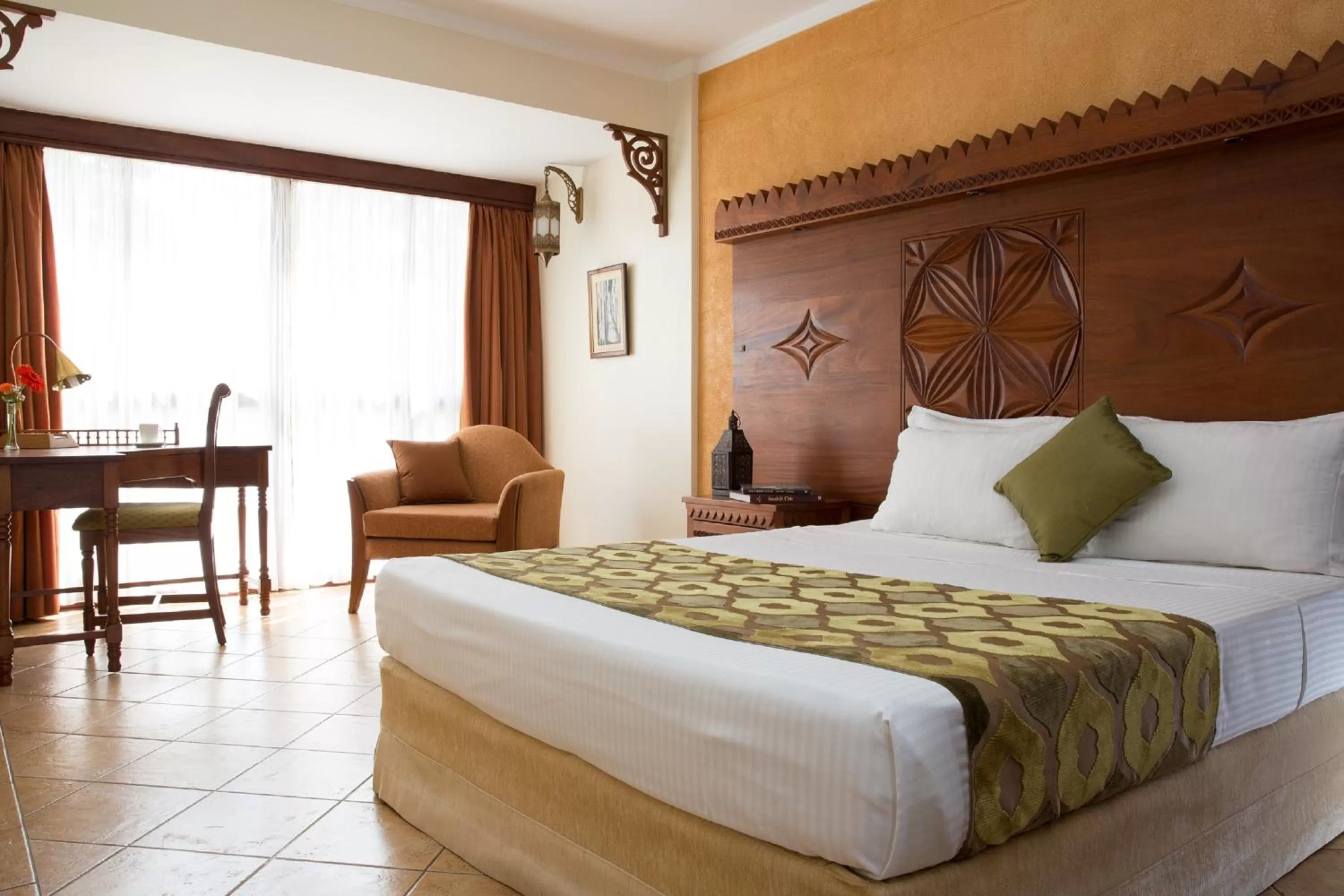 Photo of the whole room, Bed in The Heron By Sarovar Portico India