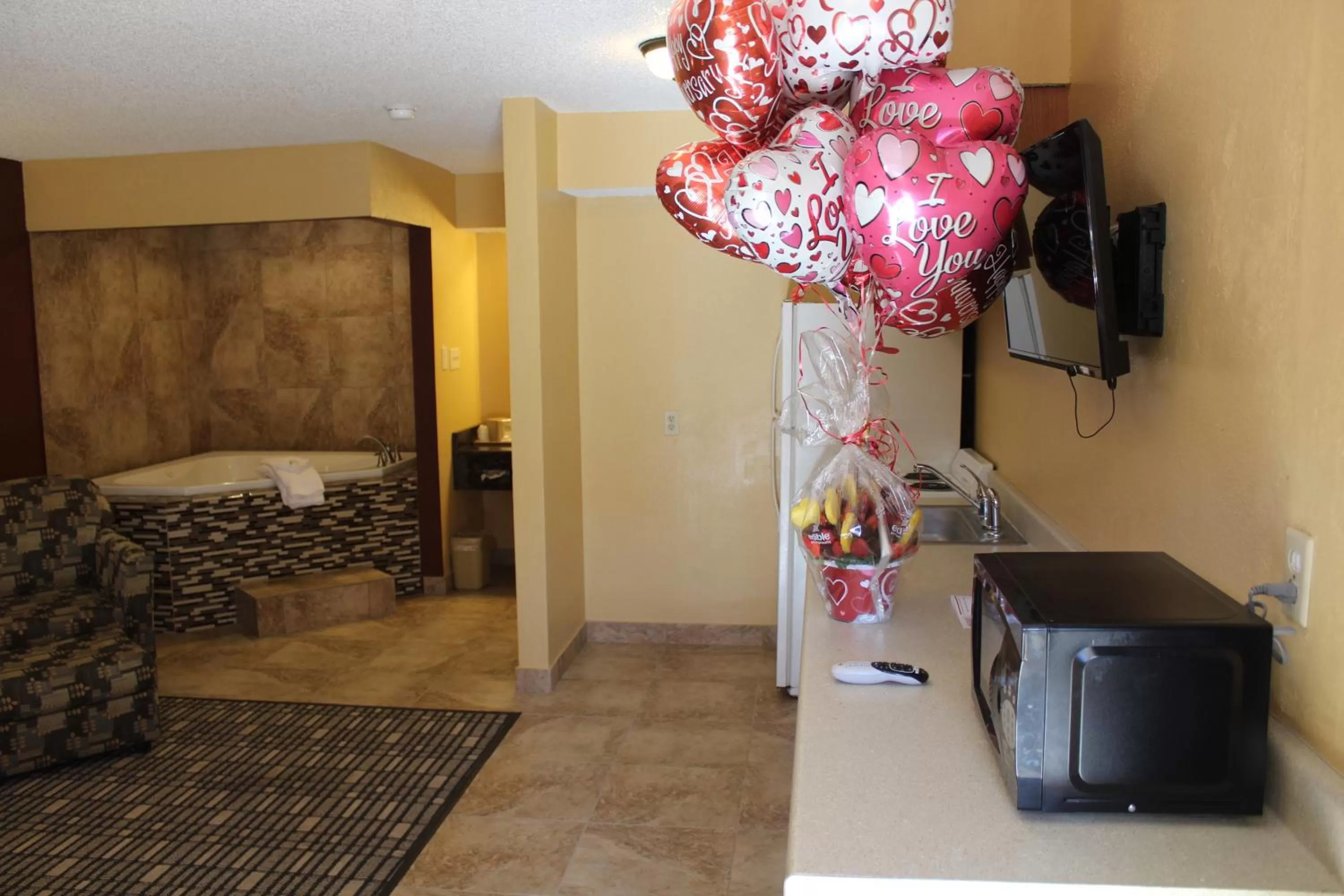 Bed in The Executive Inn & Suites