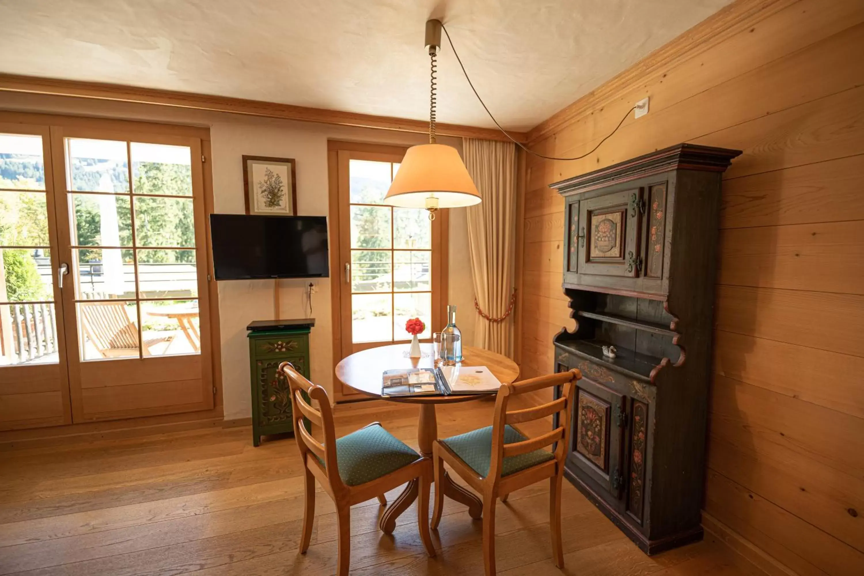 Bedroom, Dining Area in Hotel Alpenrose mit Gourmet-Restaurant Azalée