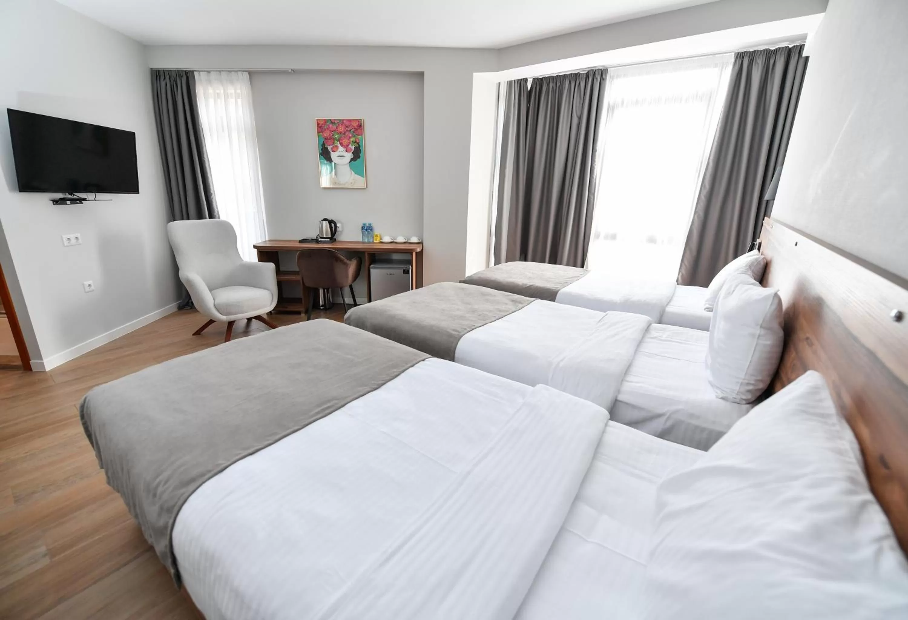 Communal lounge/ TV room, Bed in Address Boutique Hotel