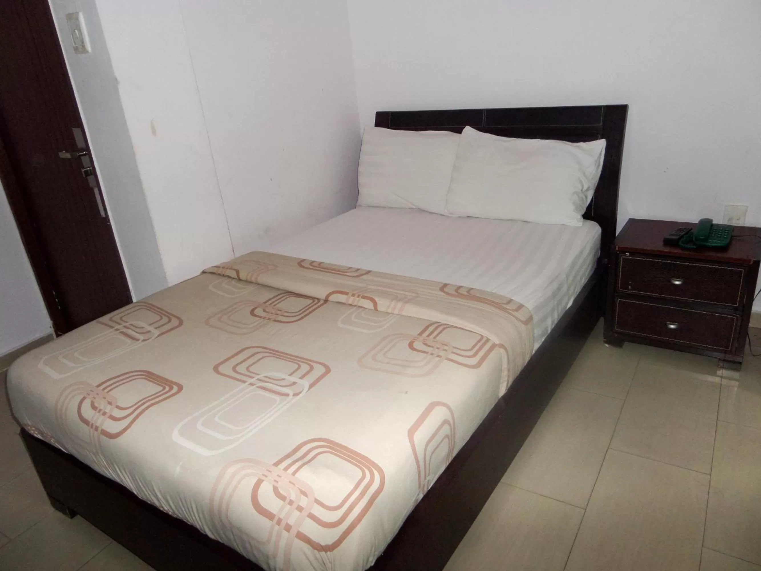 Bed in TheoDawn Hotels @ Suite 29