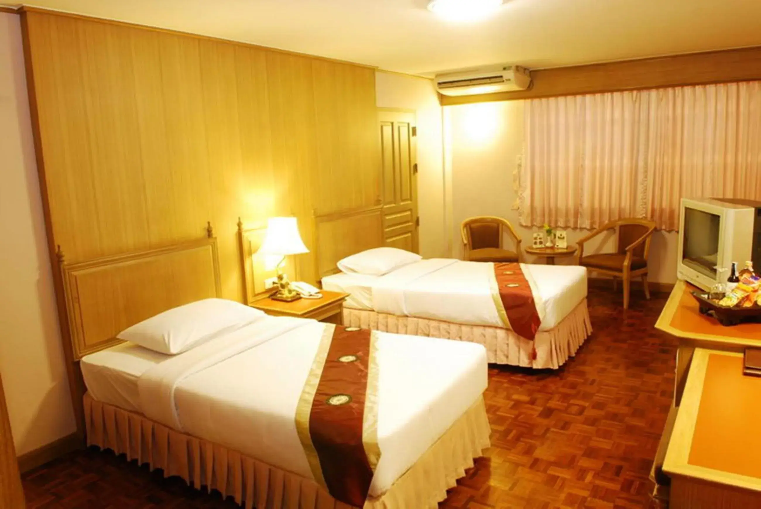 Bed in Silom Village Inn Bed in Silom Village Inn