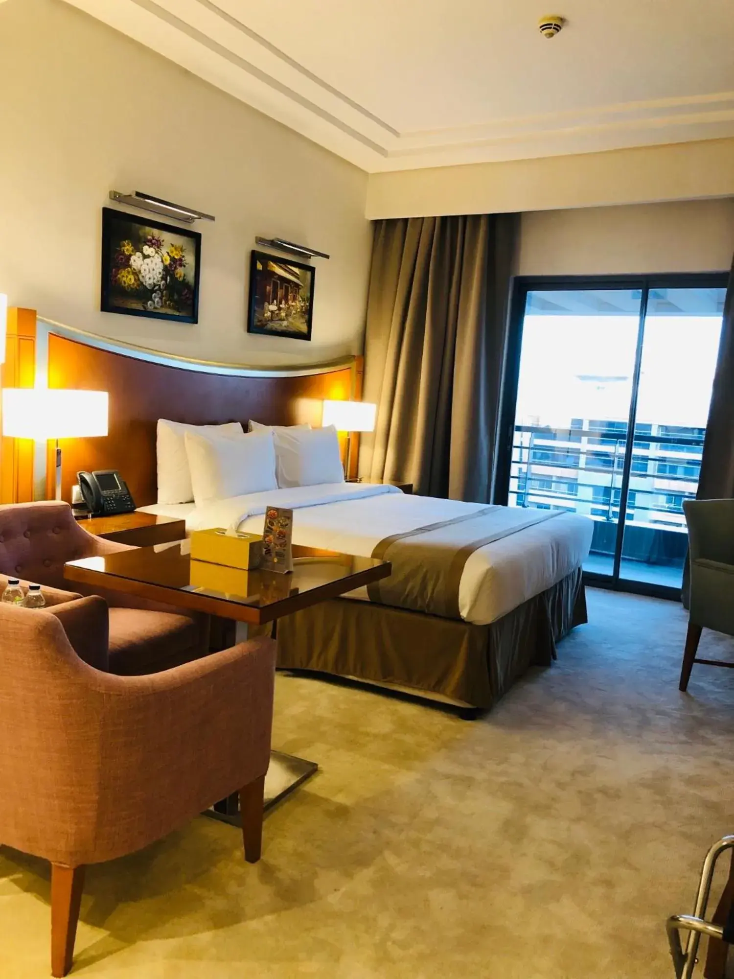 Bed in Grand Bellevue Hotel Apartment Dubai