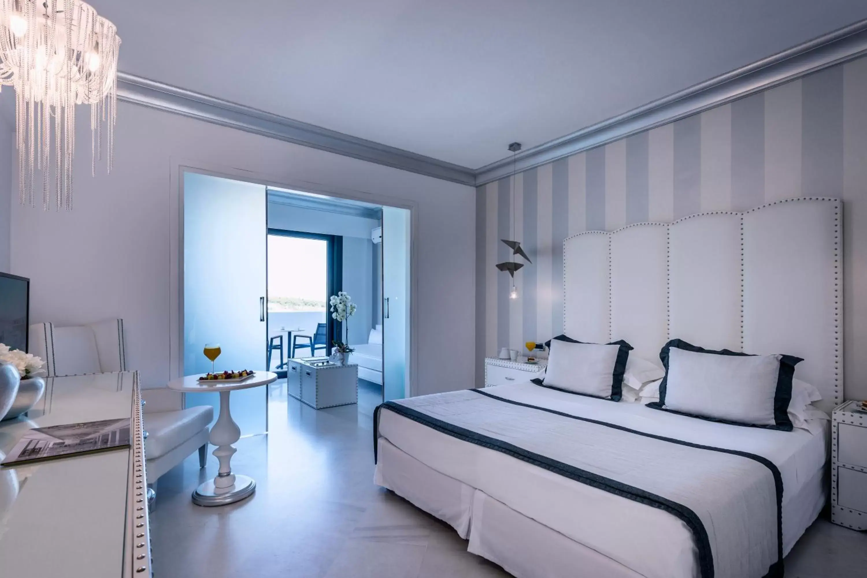 Family Room with Side Sea View in Mitsis Alila Resort & Spa Family Room with Side Sea View in Mitsis Alila Resort & Spa