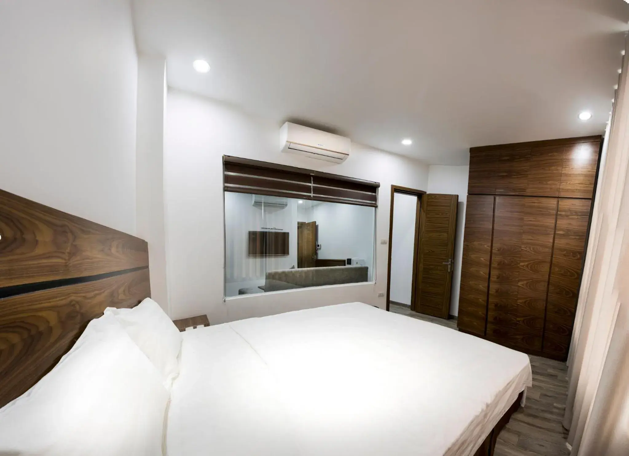 Bed in Irest Apartment