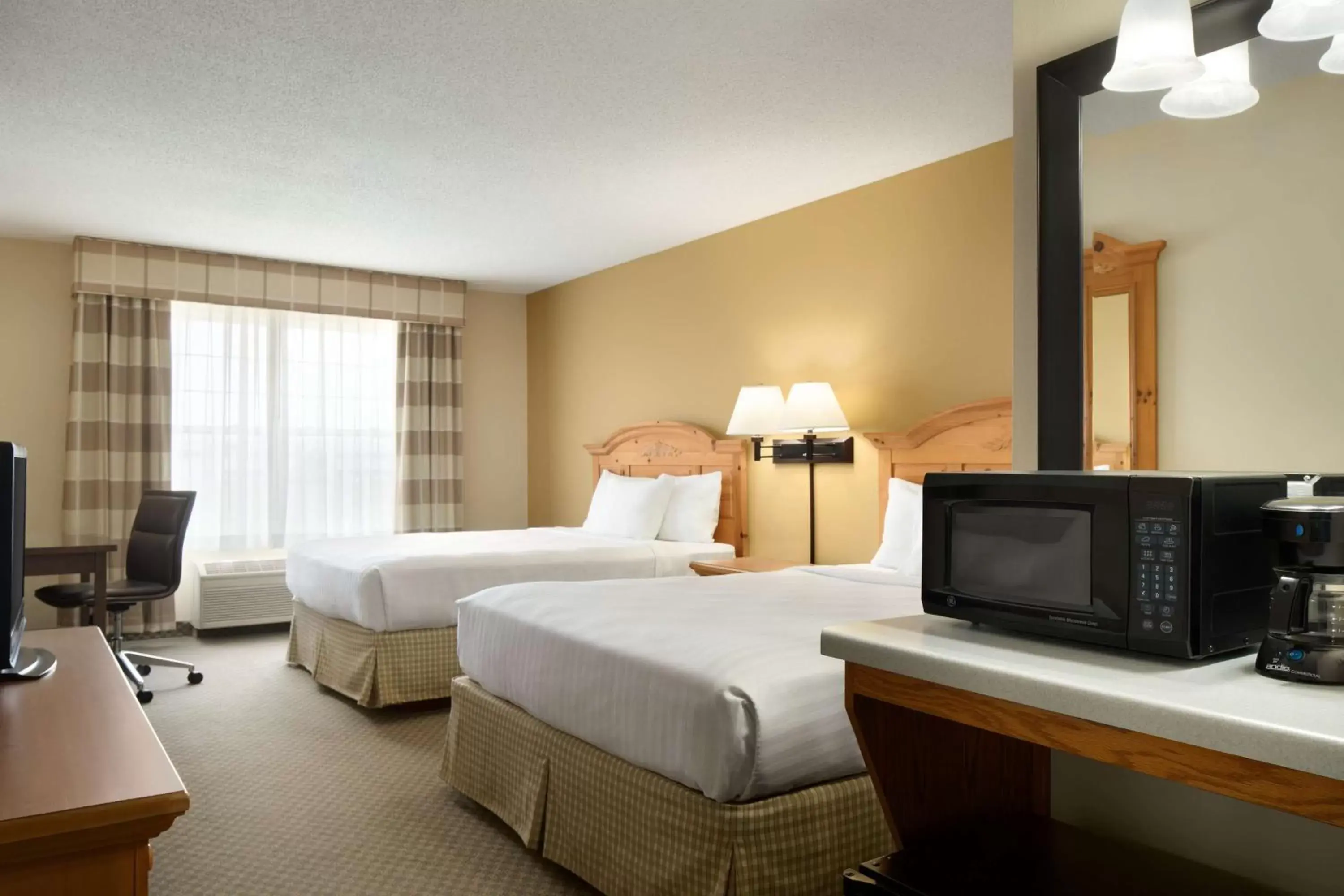 Photo of the whole room, Bed in Country Inn & Suites by Radisson, Grinnell, IA