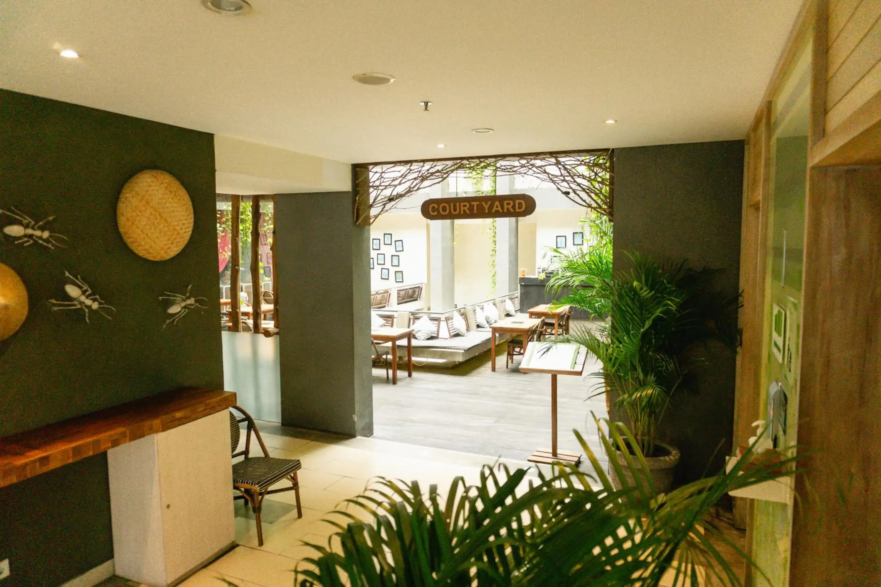 Lobby or reception in Grandmas Plus Hotel Legian Lobby or reception in Grandmas Plus Hotel Legian