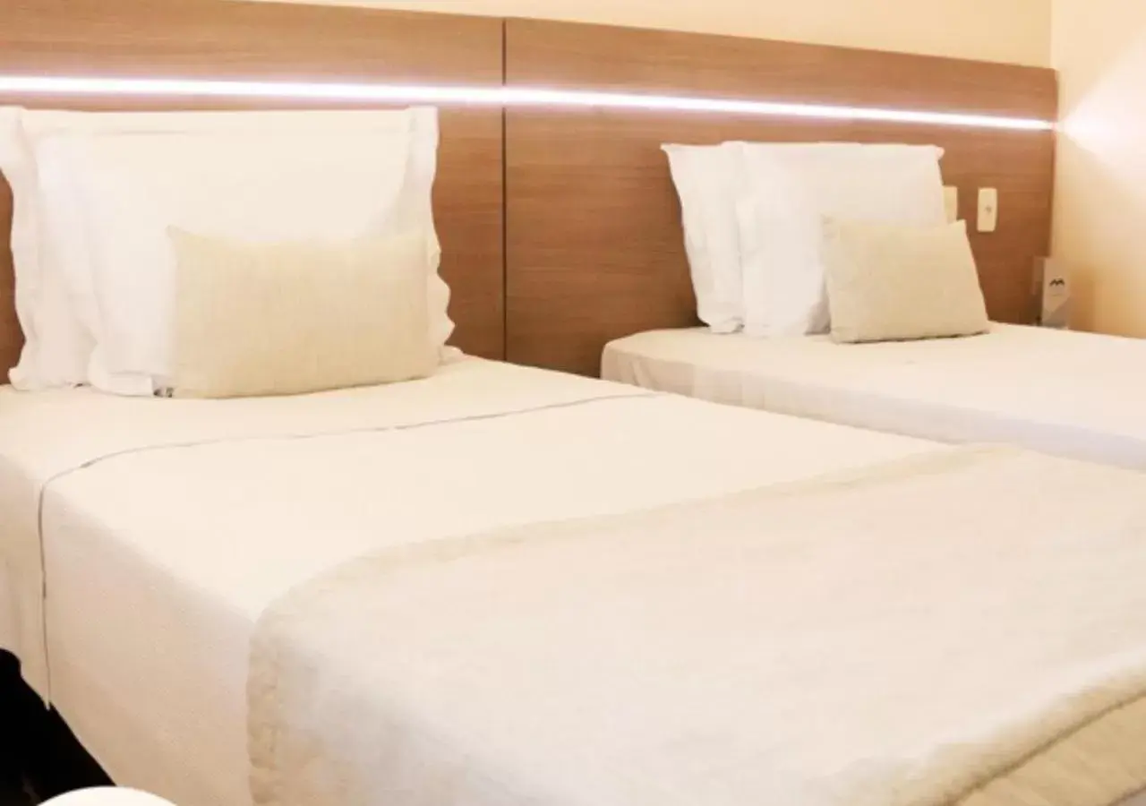 Property building, Bed in Hotel Adrianópolis All Suites