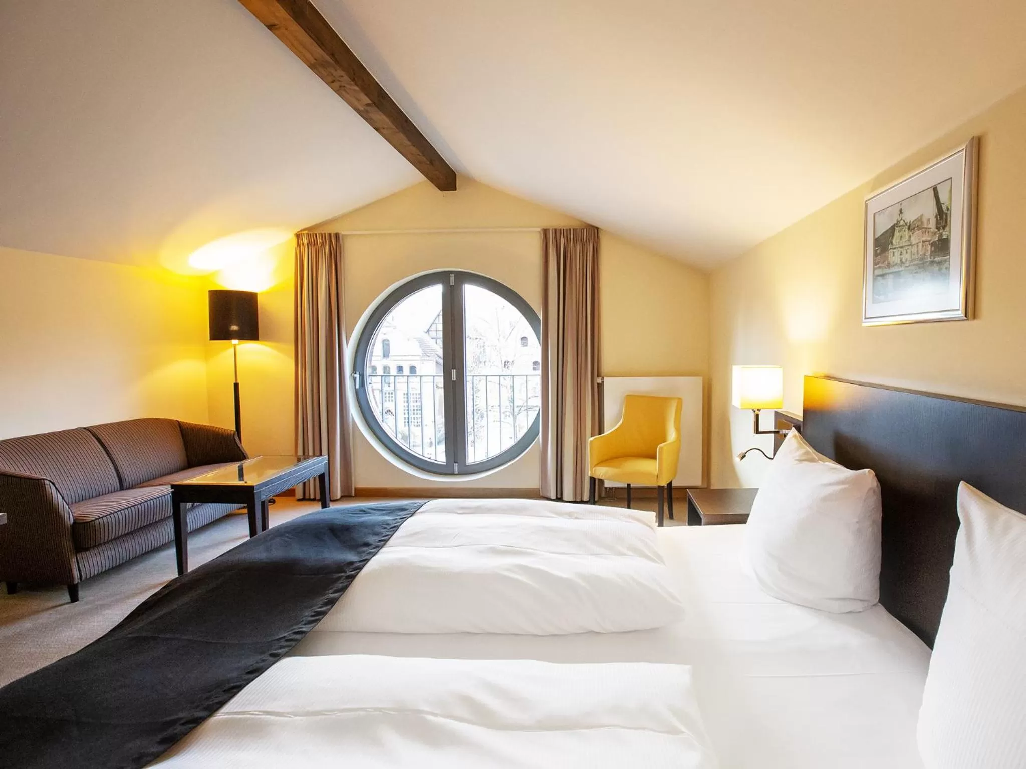 Photo of the whole room, Bed in DORMERO Hotel Altes Kaufhaus Lüneburg