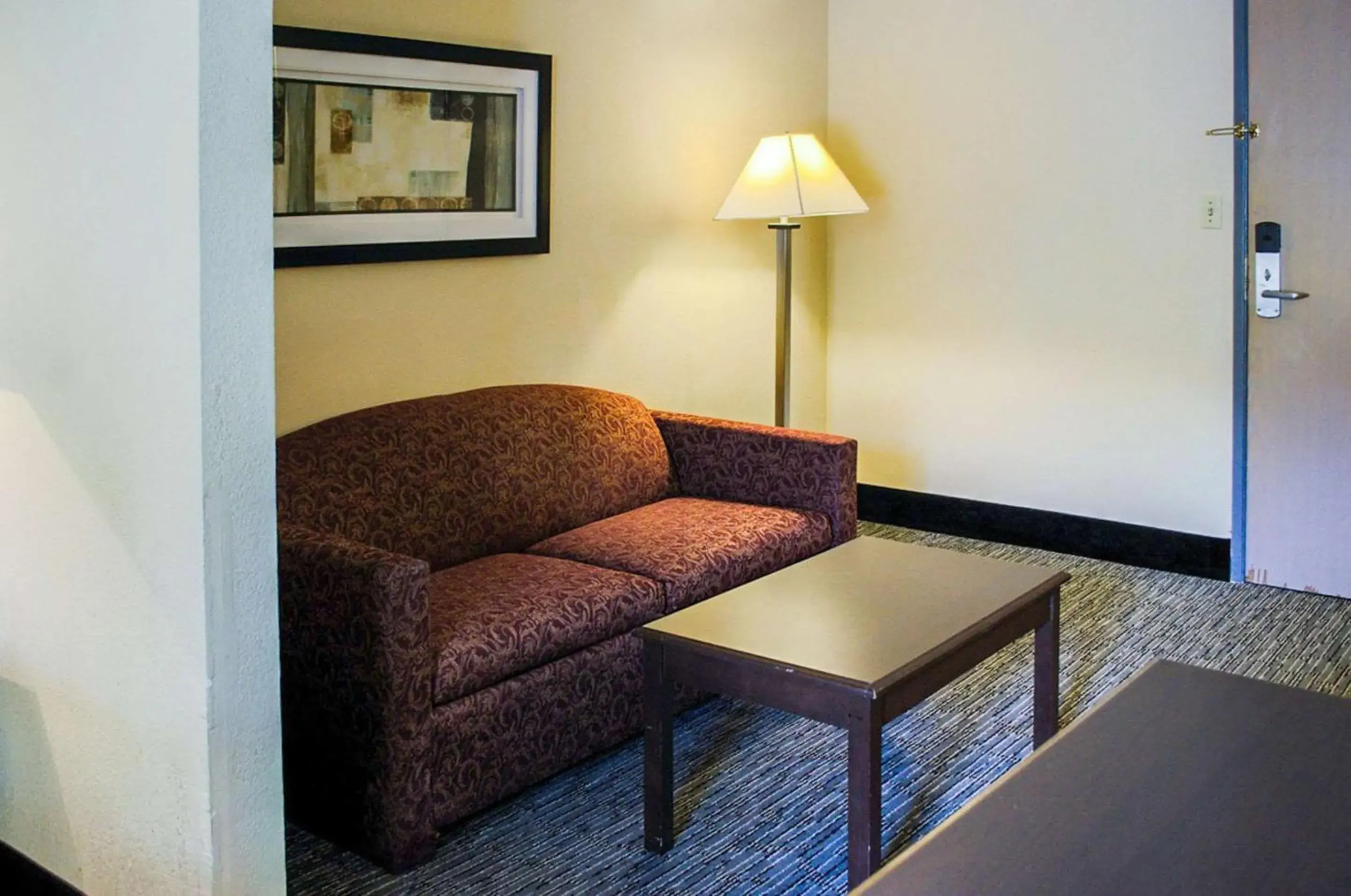 Photo of the whole room, Seating Area in Quality Inn & Suites at Airport Blvd I-65