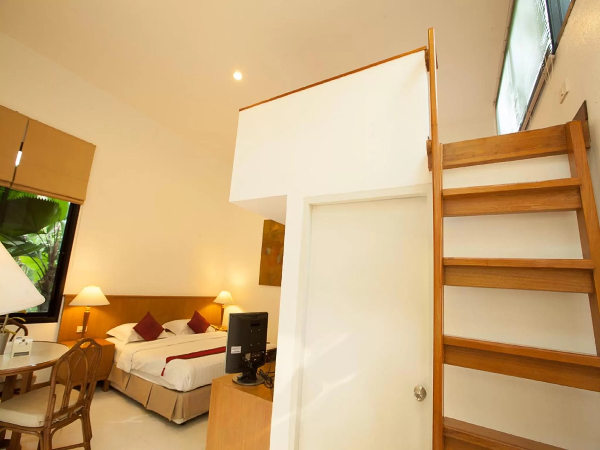 Bedroom in Nern Chalet Beachfront Hotel