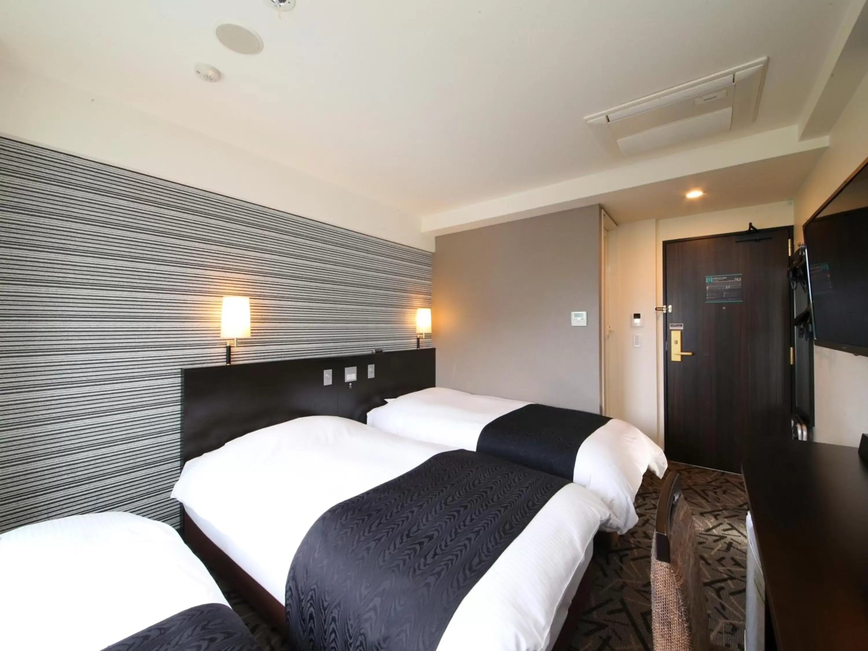 Photo of the whole room, Bed in APA Hotel & Resort Tokyo Bay Makuhari