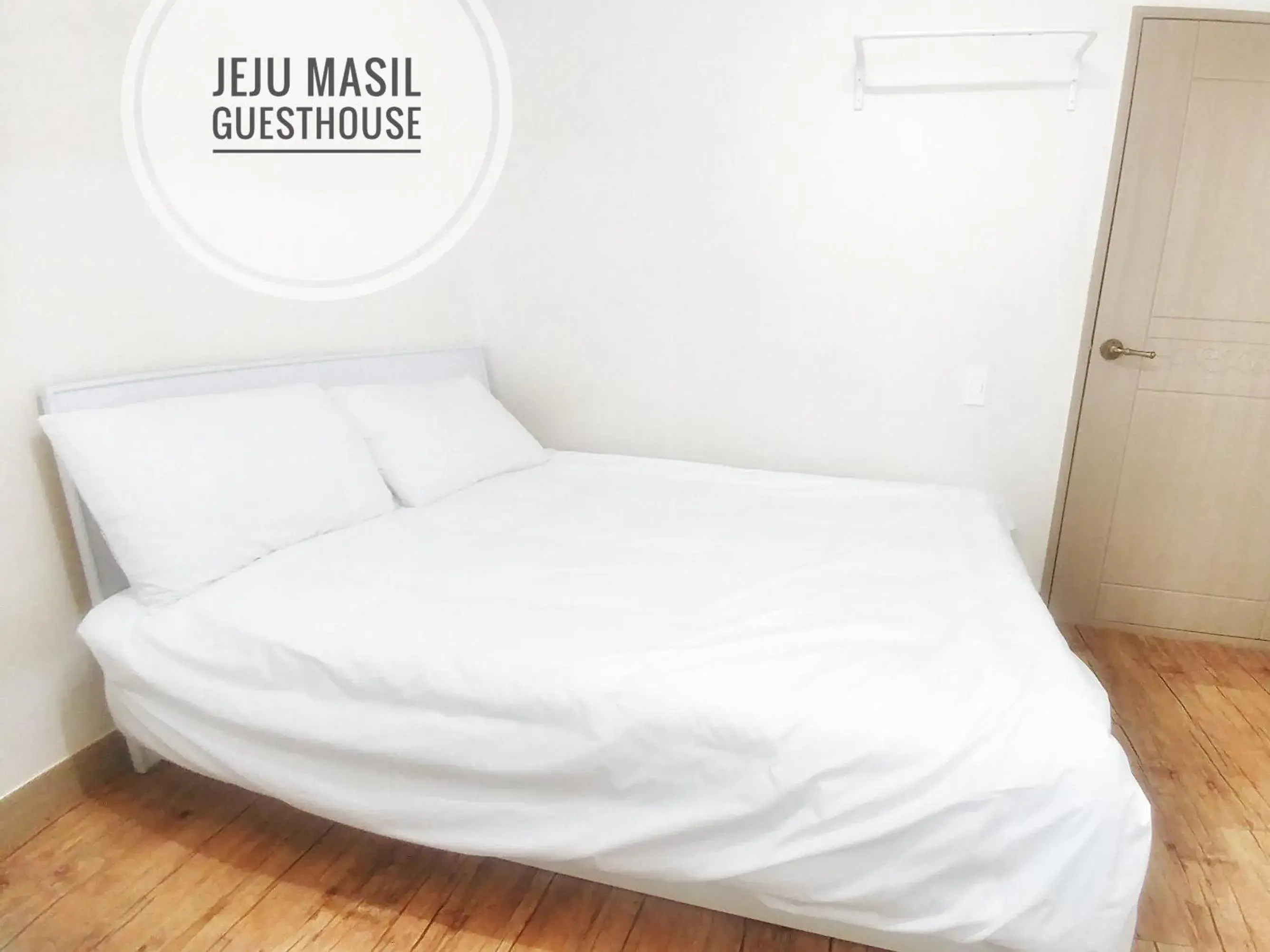 Bed in Masil Guesthouse Jeju