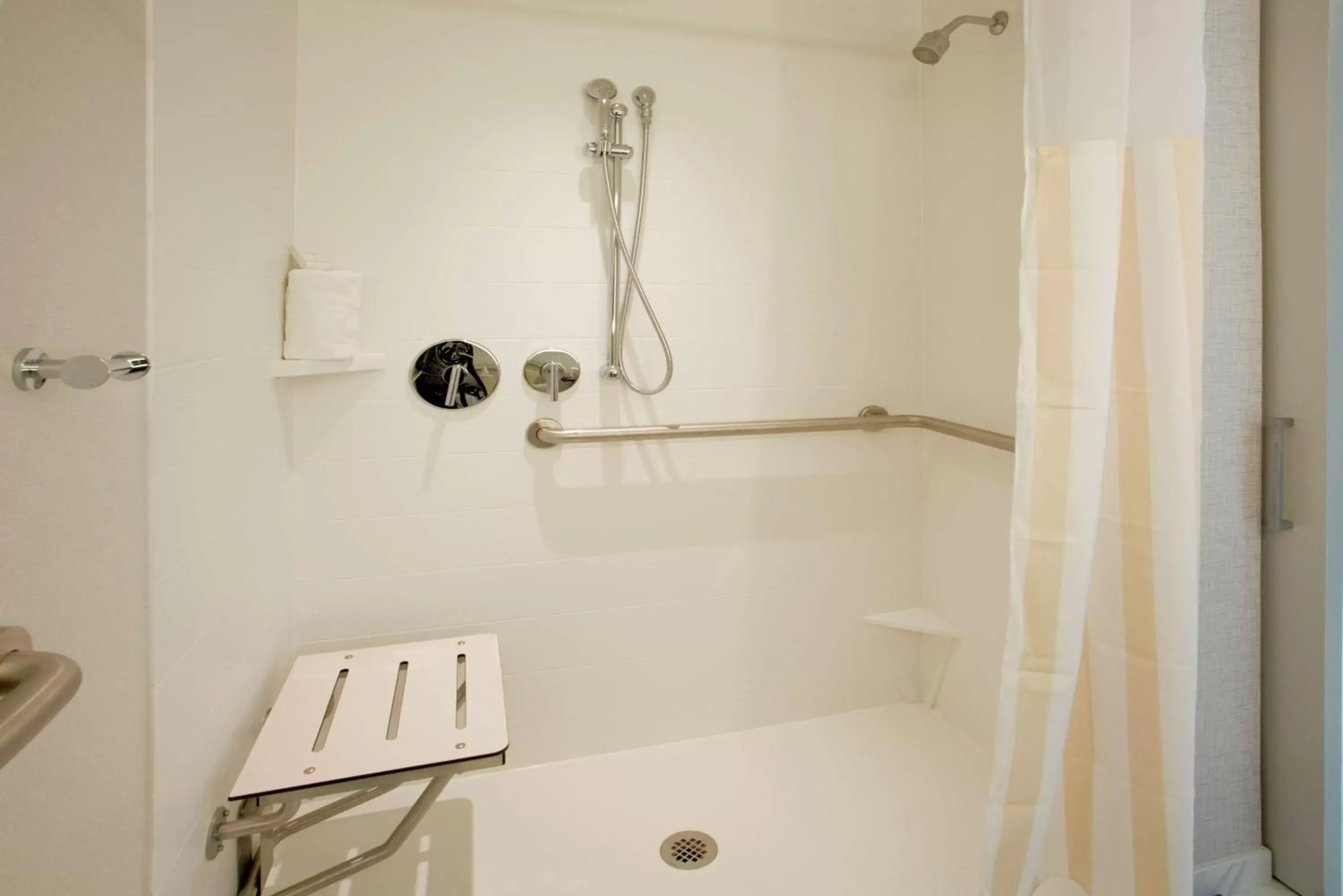 Shower, Bathroom in Hilton Garden Inn New York Central Park South-Midtown West